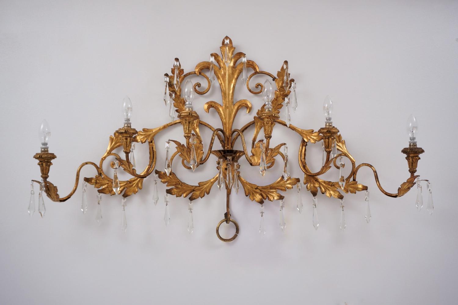 Gilt tole sconce,large 6 lights, with faceted crystals, 1950`s ca, Italy. 

This large sconce  has been  thoroughly cleaned respecting the antique patina. Newly rewired & earthed with gold silk cable and new fitted brass & porcelain lamp holders. It