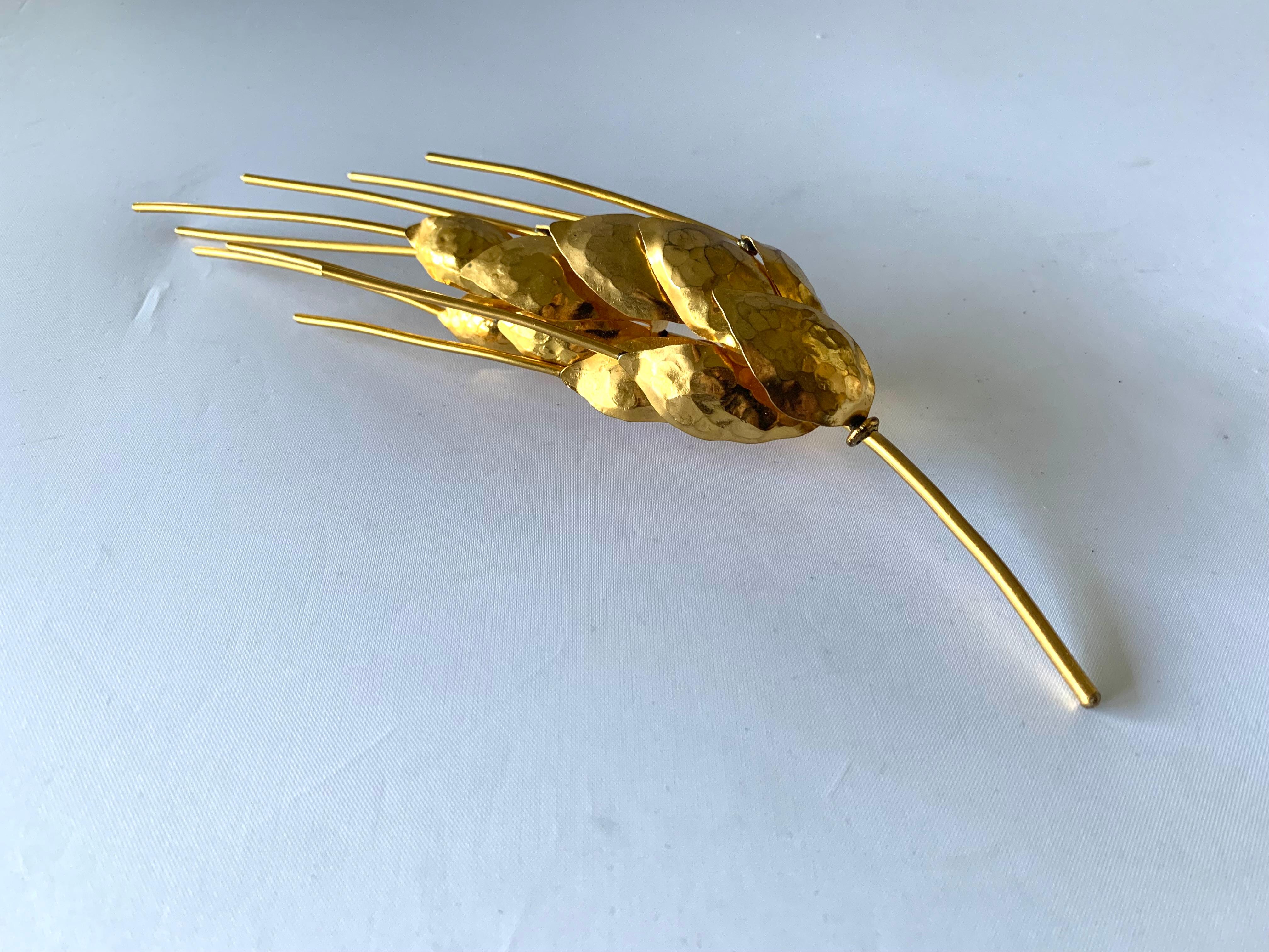 Vintage Herve Van der Straeten wheat brooch - hammered gold-plated brass in a three-dimensional design. Signed Herve Van der Straeten.

