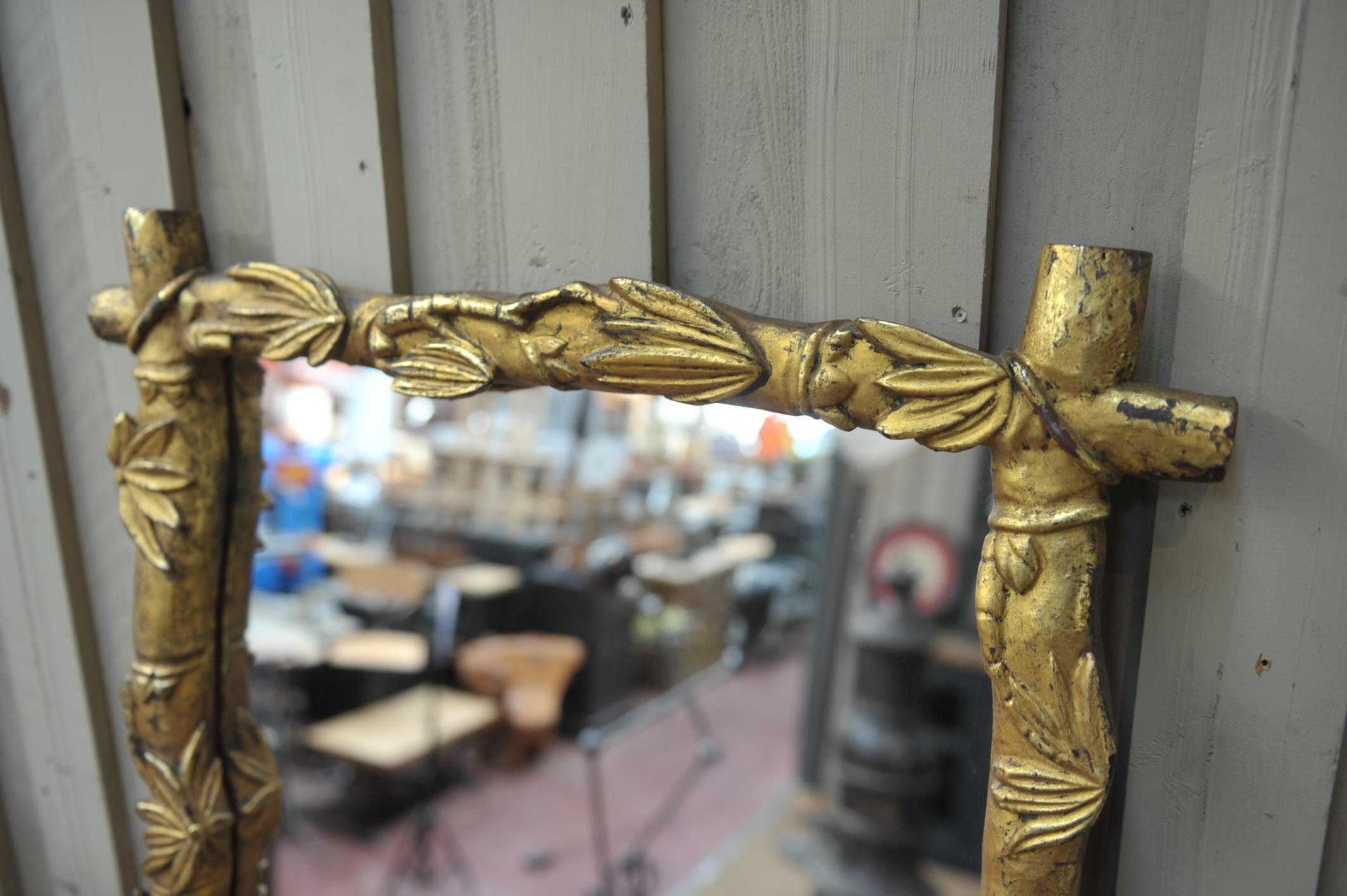 Giltwood and glass wall mirror with Palm Tree leaf decor circa 1950 back in solid oak.