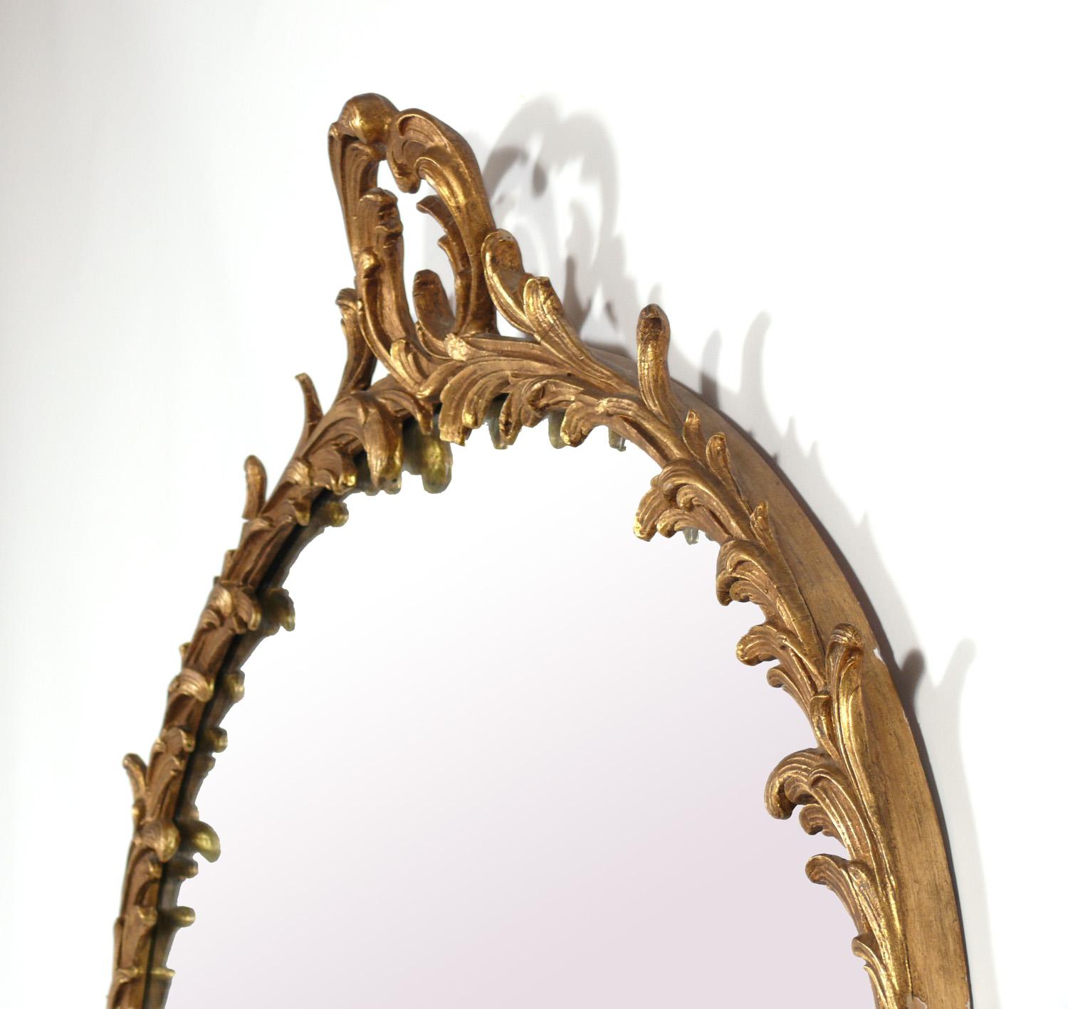 Gilt Wood and Gesso Foliate Mirror, France, circa 1940s. It measures an impressive 43.5