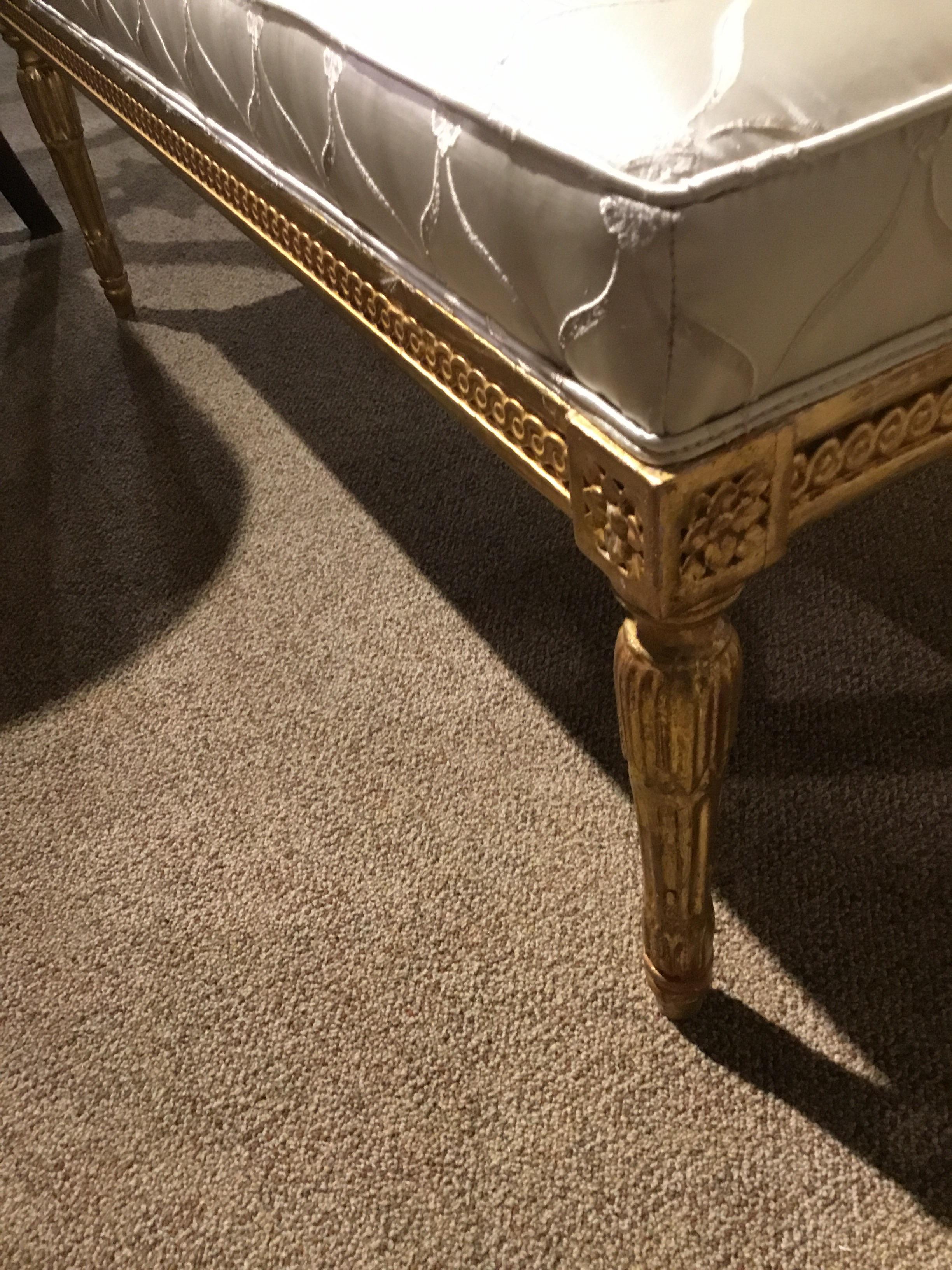 Beautiful reeded legs and banding in giltwood adorn the structure of 
This bench.