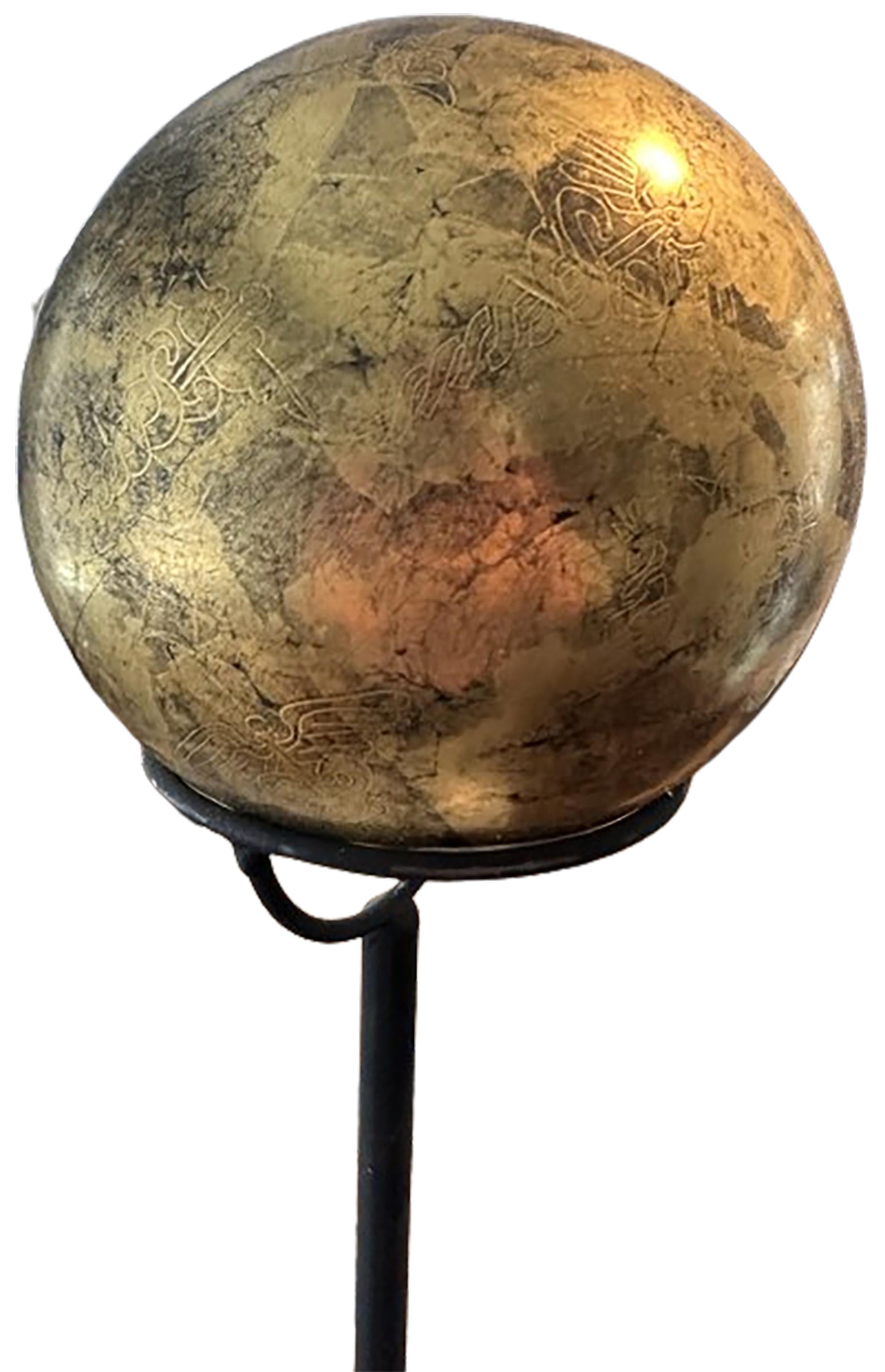 An exquisite water gilt wooden sphere sculpture titled “Medicine Ball” by American artist Michael Stallings. This piece was created as a part of the artists ‘Visual Pun series. Created in Texas in the early 2000’s. The repeated caduceus symbols were