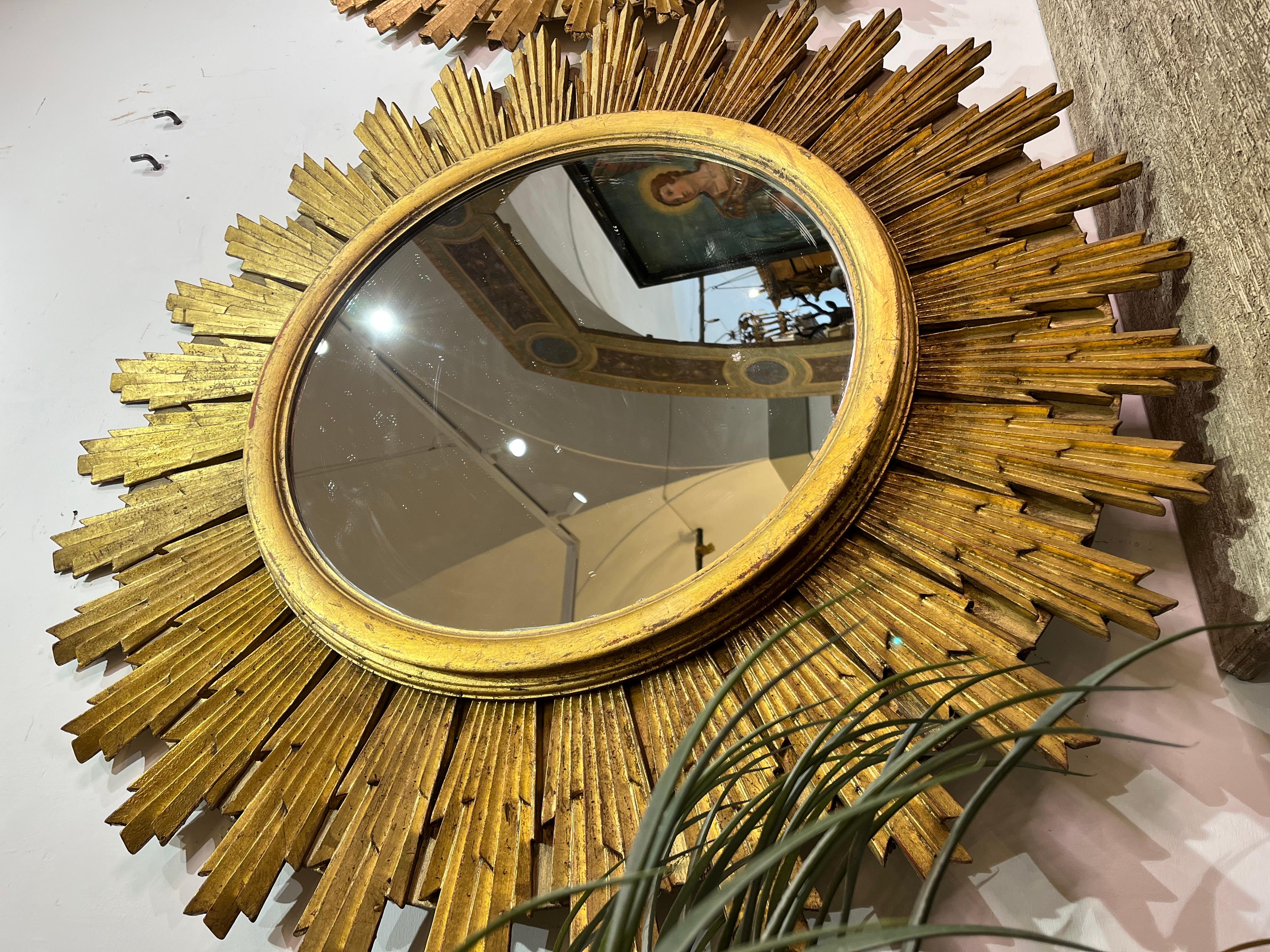Italian Gilt wood sunburst mirror en vente