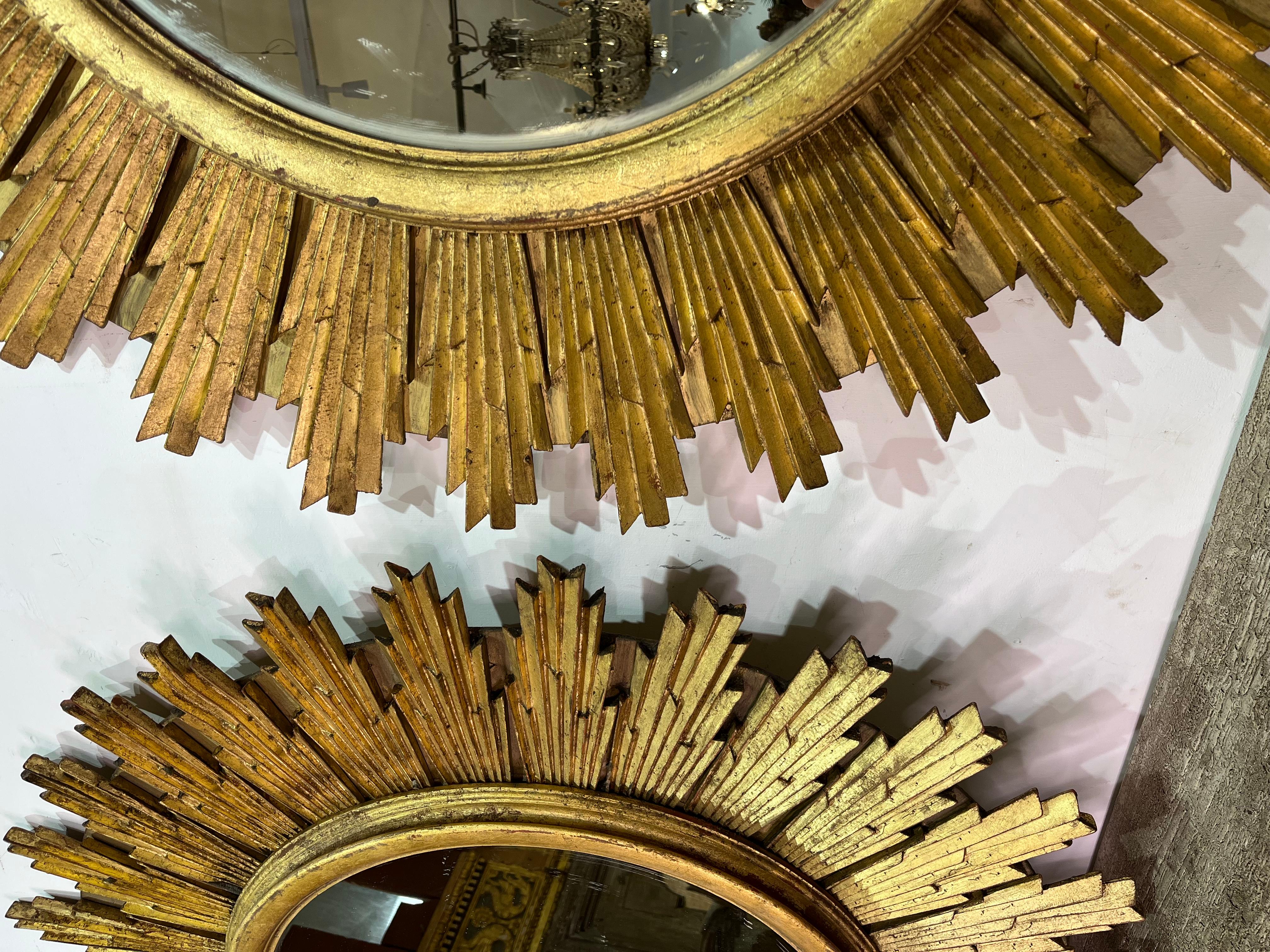 Sculpté Gilt wood sunburst mirror en vente