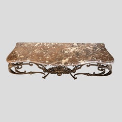 Gilt wrought iron console table attributed to Gilbert Poillerat