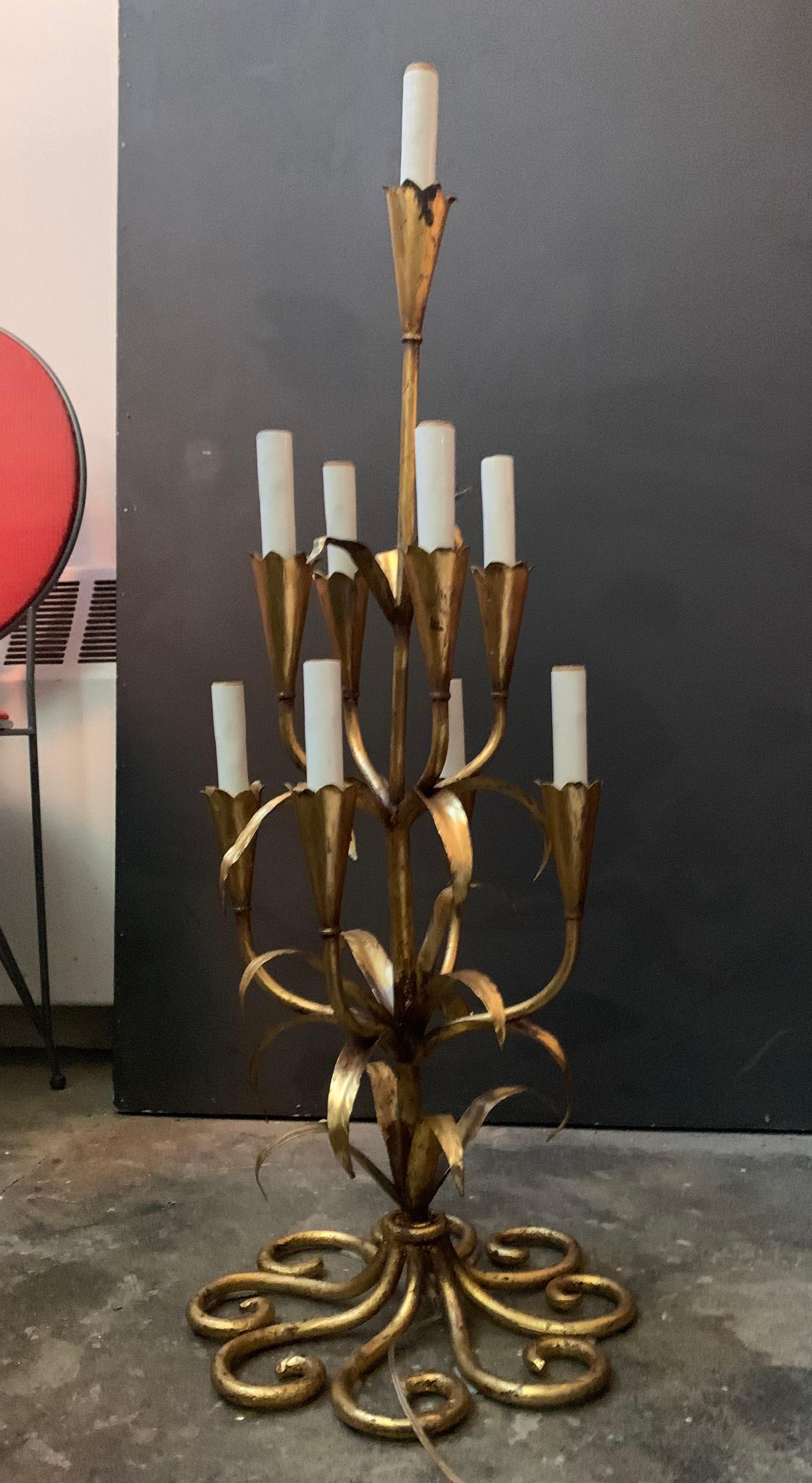 Gilt wrought iron foliate candelabra table or floor lamp. Hollywood Regency, midcentury electrified candelabra with ornate gilt wrought iron leaves and stems.