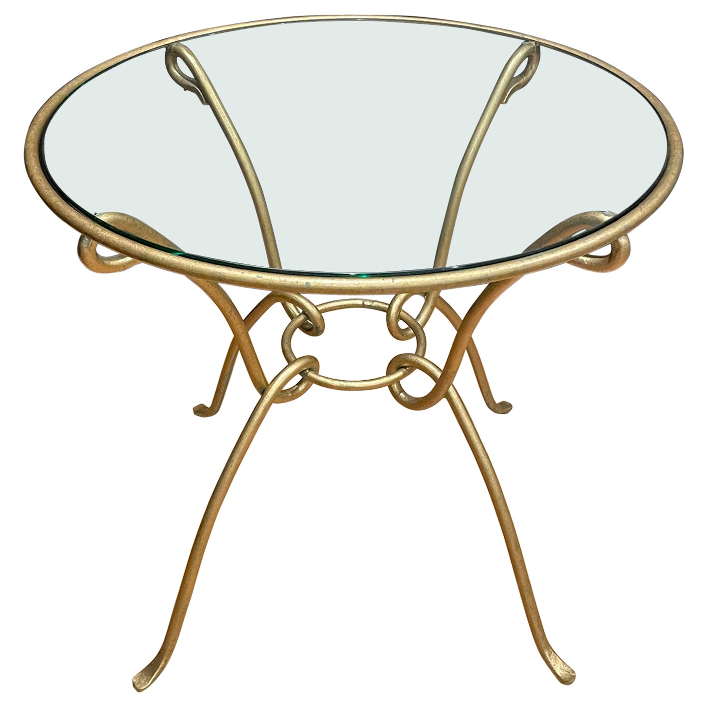Mesa de centro de hierro forjado dorado estilo René Drouet con tapa de cristal