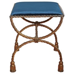 Tabouret de coiffeuse en fer forgé doré:: avec corde et pompons