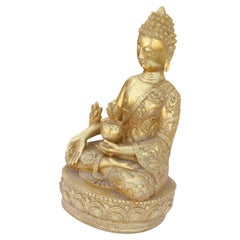 Buda meditador de bronce dorado