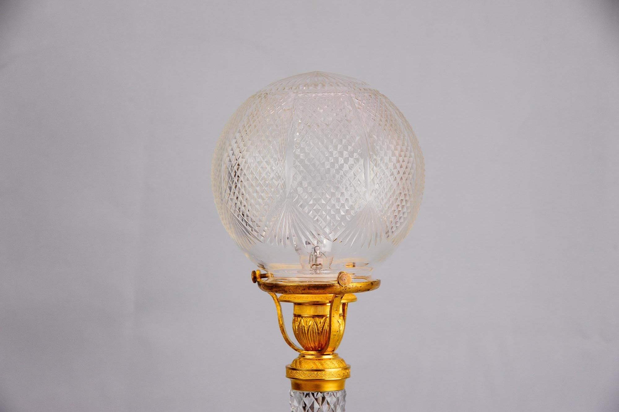 Gilded historistic table lamp, circa 1890s with original glass shade
Original condition.