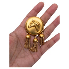 Gilted metal "horse" brooch