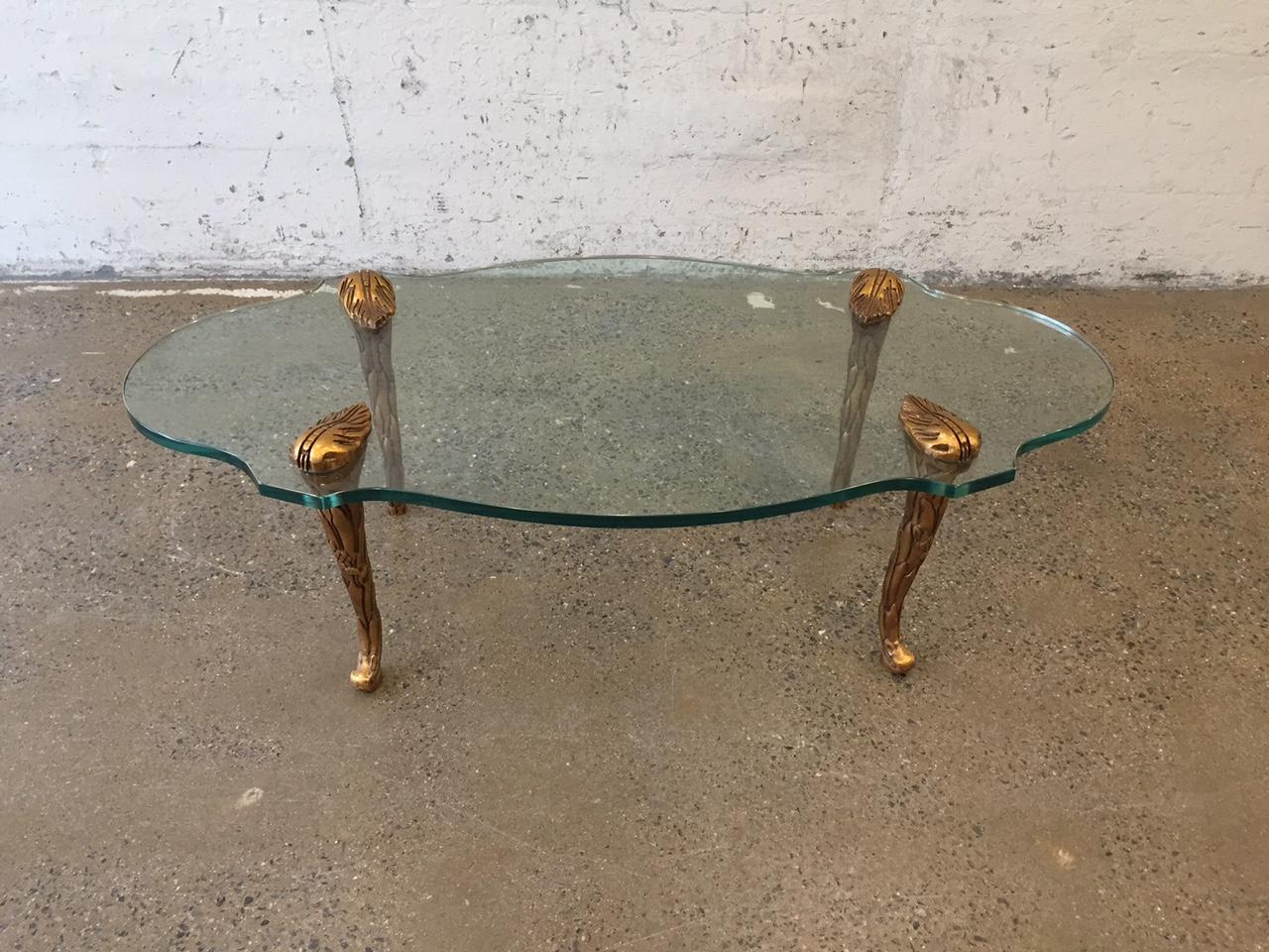 Giltwood and glass coffee table style of Maison Charles.