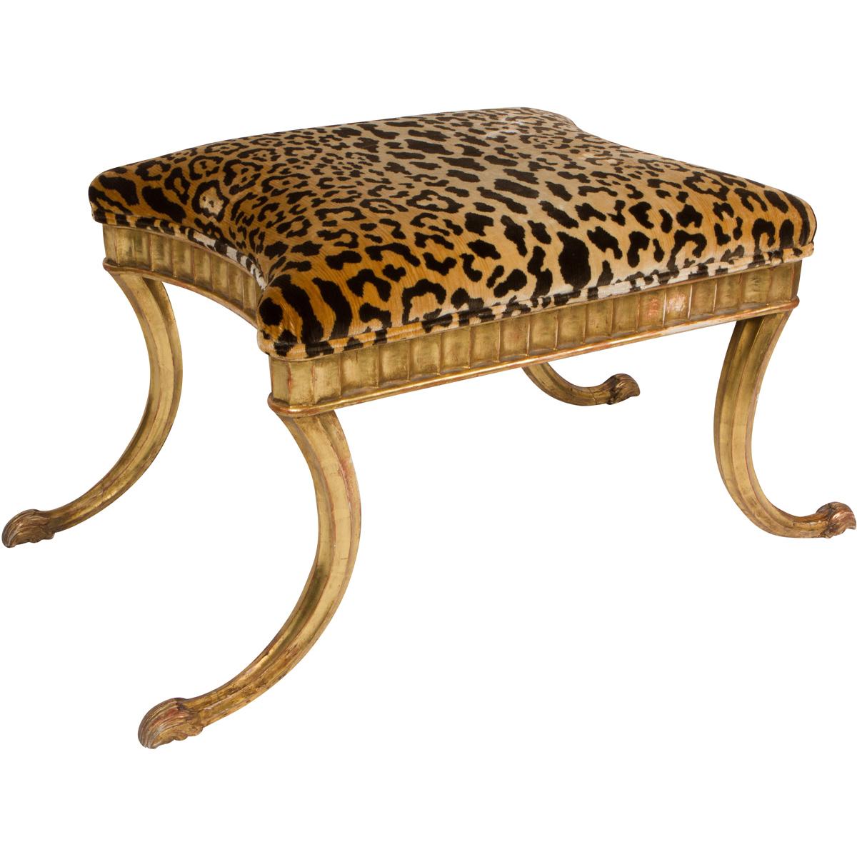 Stunning giltwood bench in a Klismos style, upholstered in leopard velvet by Mioni.