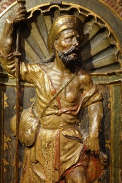 Bois doré et représentation en demi-relief polychrome de Saint Rococo. Espagne, 16ème