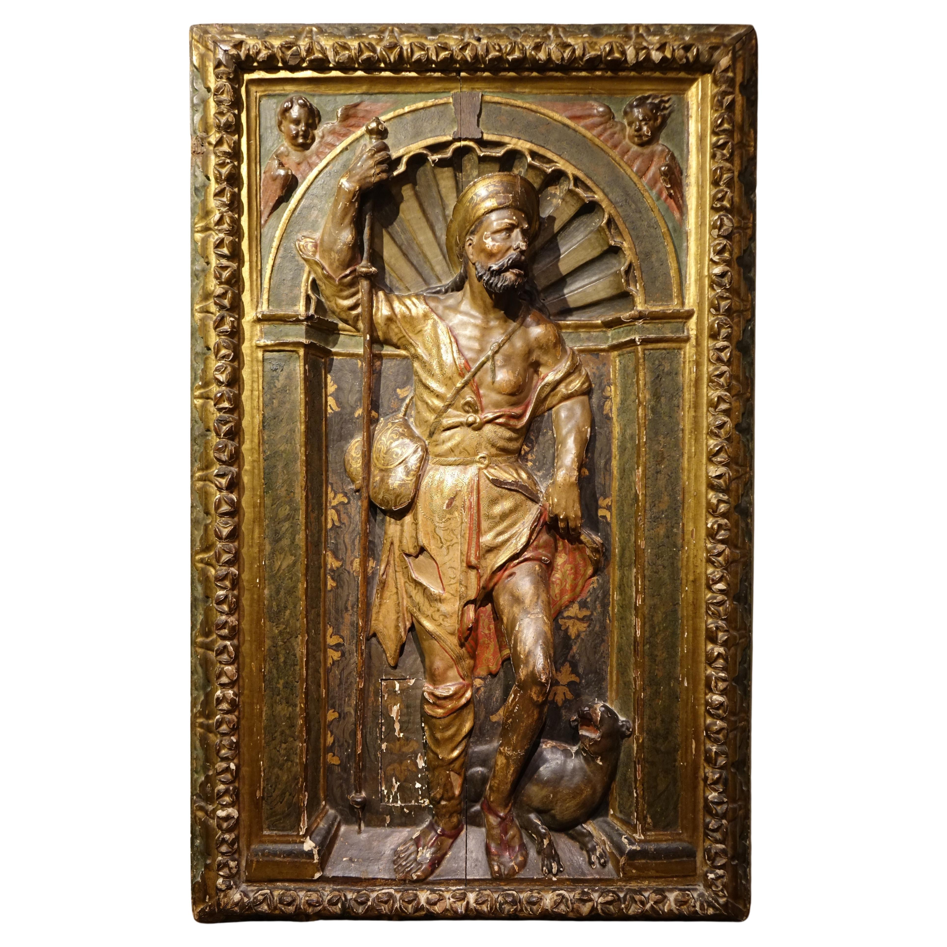 Giltwood and polychrome half-relief representation of Saint Rococo. Spain, 16th  For Sale