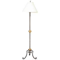 Lampadaire en bois doré et fer forgé