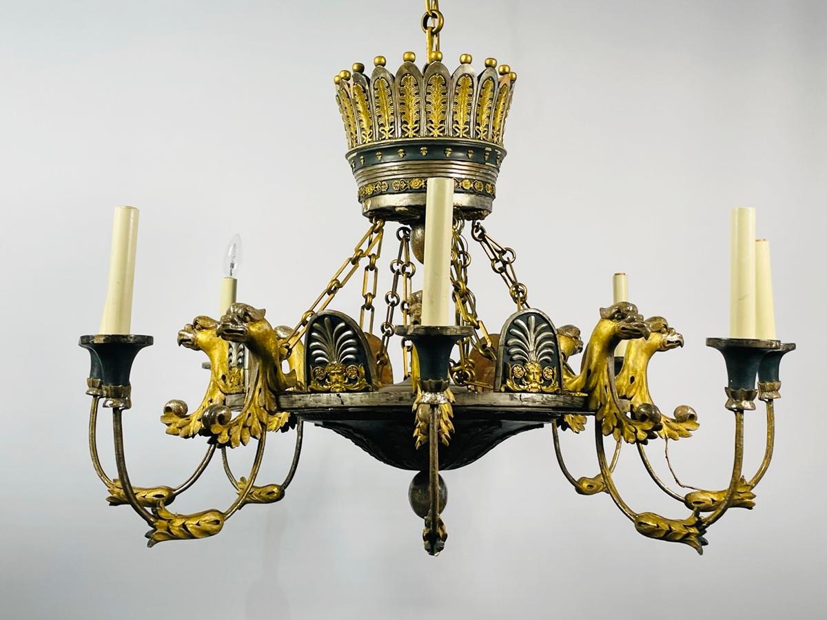 Introducing the exquisite Giltwood & Bronze Empire Style Chandelier, a stunning addition to any luxurious home décor. Crafted with intricate detailing, this chandelier features eight arms adorned with delicate bronze accents and a regal crown that