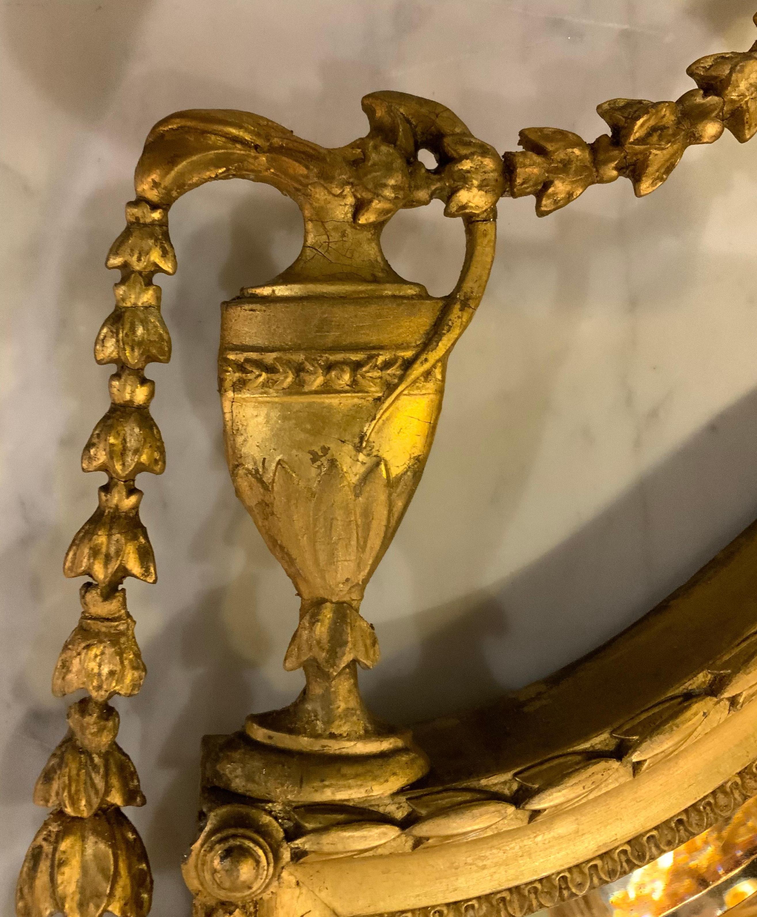 Giltwood Edwardian Shield Form Mirror in the Adam Taste In Excellent Condition For Sale In Houston, TX