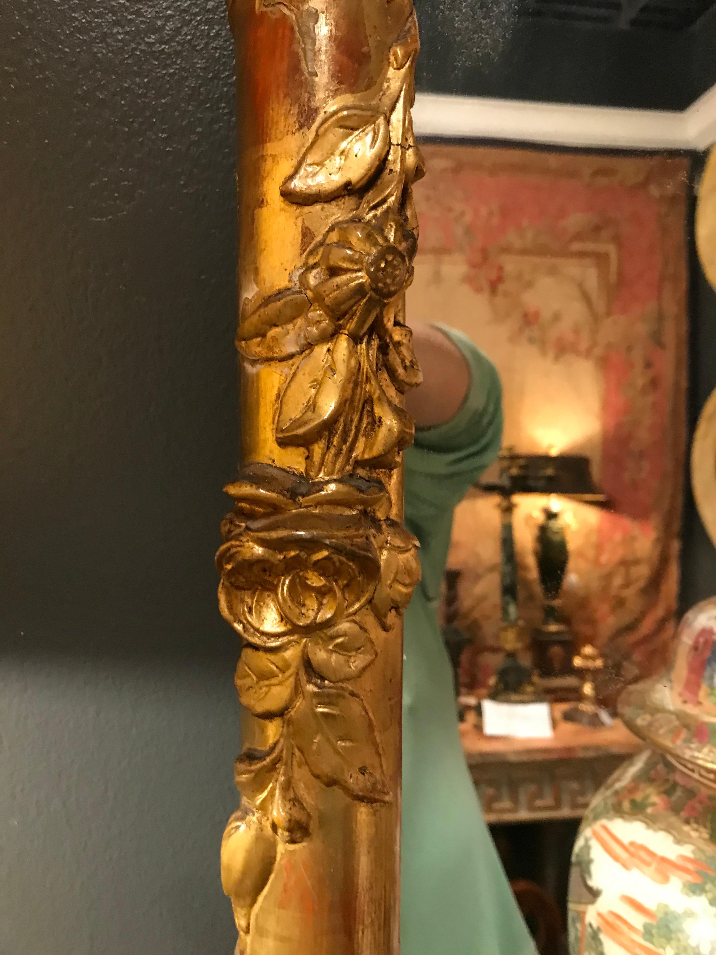 French Giltwood Faux Bamboo Mirror with Cherubs or Putti Crest with Floral Garlands