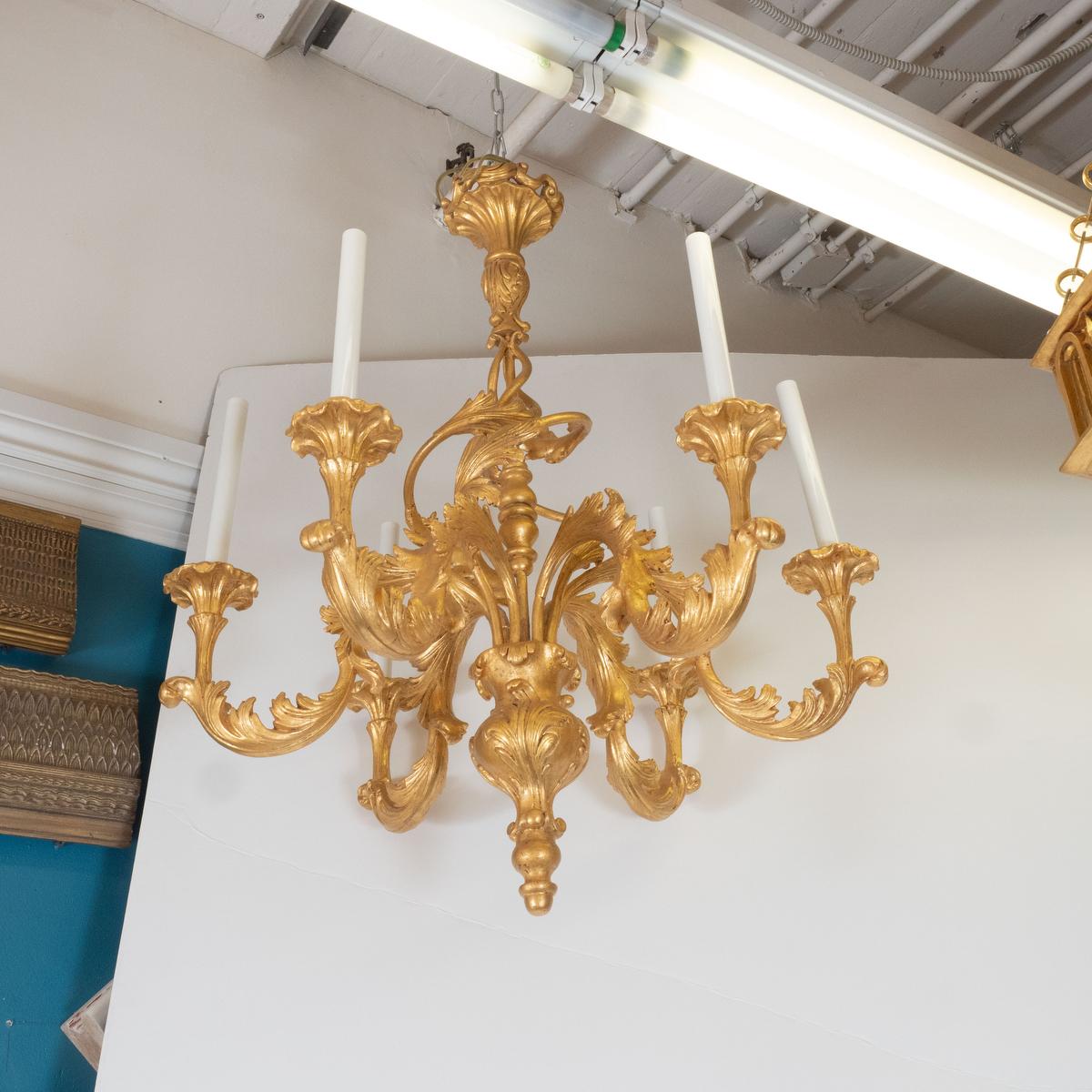 Giltwood woodcarving chandelier with intricately detailed foliate motif by master woodworker Carlos Villegas