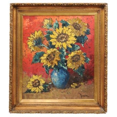  Peinture à l'huile sur panneau encadrée sur bois doré représentant des tournesols dans un vase, signée, 20e siècle