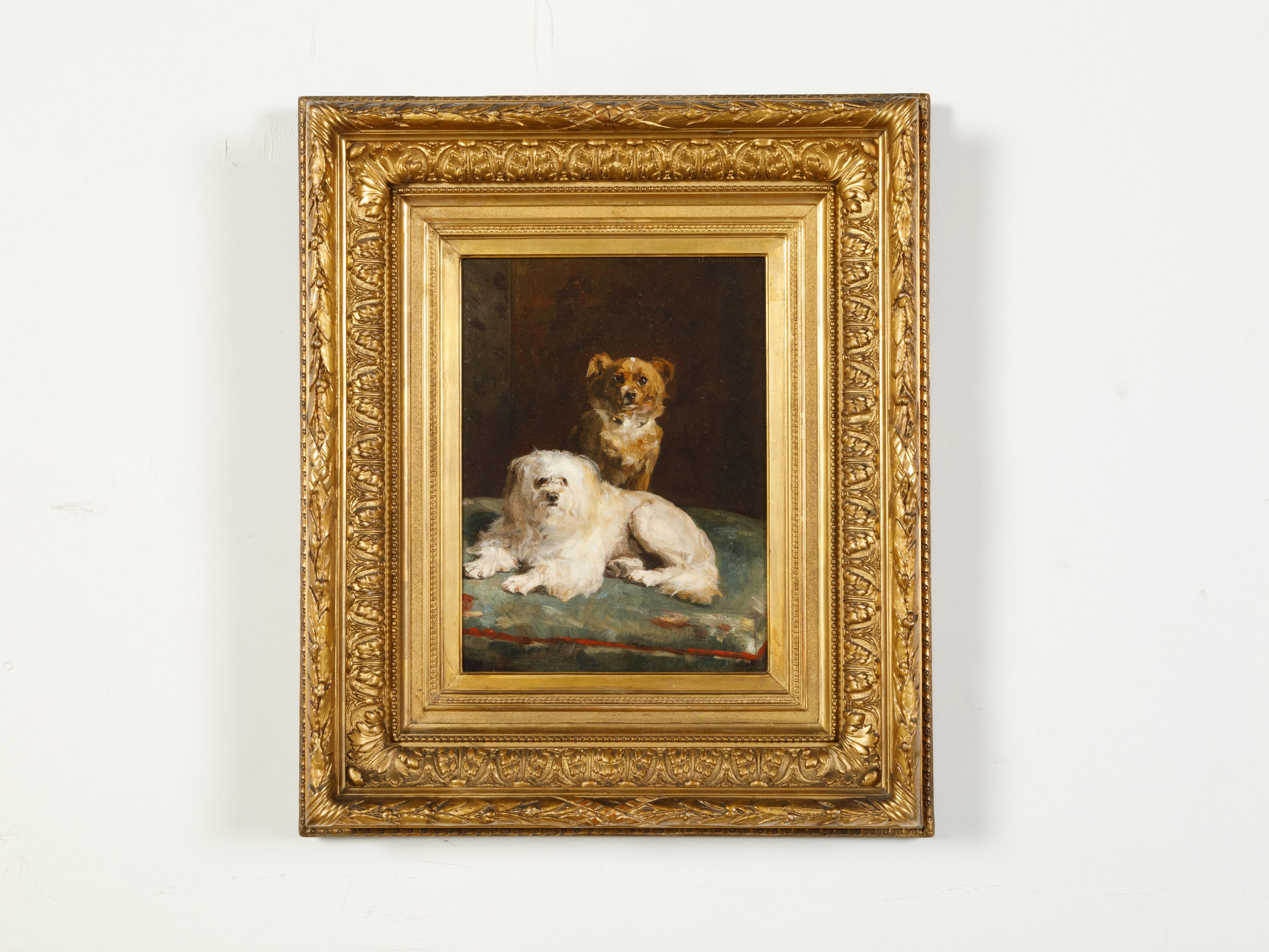 A Belgian framed oil on canvas painting by Charles Van den Eycken (1859 – 1923), depicting two dogs in an interior. Created in Belgium during the second half of the 19th century, this oil on canvas depicts an interior scene. Two small dogs, a white