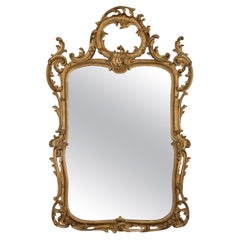 Specchio italiano in legno dorato con patina