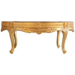 Table basse ronde en bois doré