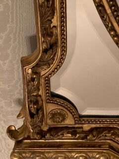 Miroir en bois doré style louis XVI