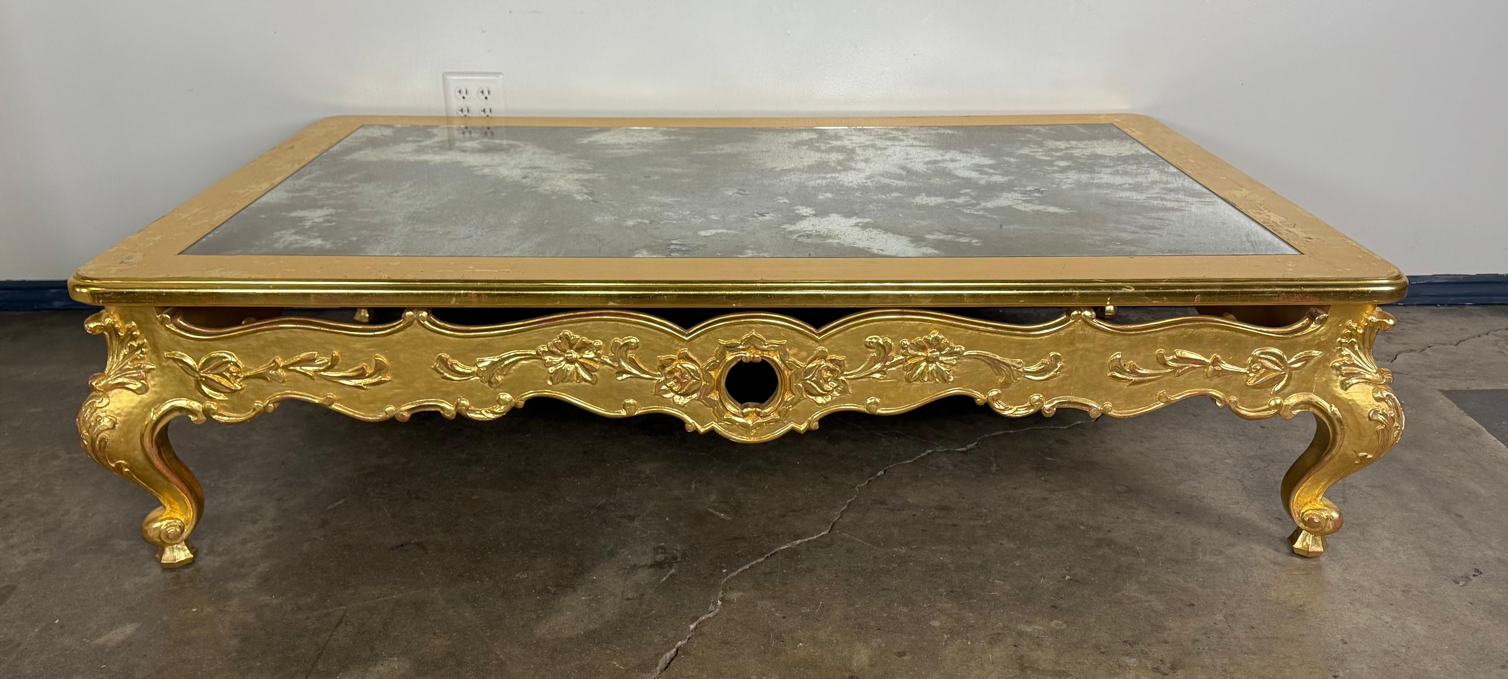 Giltwood Rococo Coffee Table with Antiqued Mirrored Top For Sale