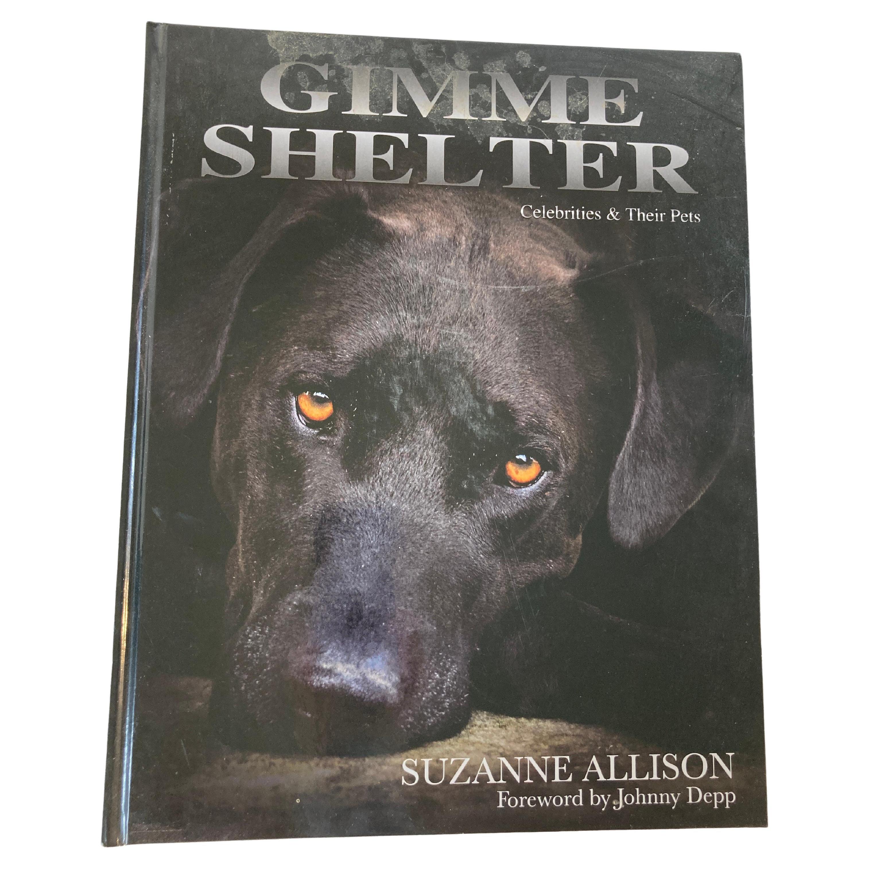 Gimme Shelter: Celebrities & Their Pets by Suzanne Allison.
Publication Date: 2014
This is a beautiful photographic book.
Fine condition oversized (large folio, over 14 inches tall) color photographic boards. 
Profusely illustrated with color