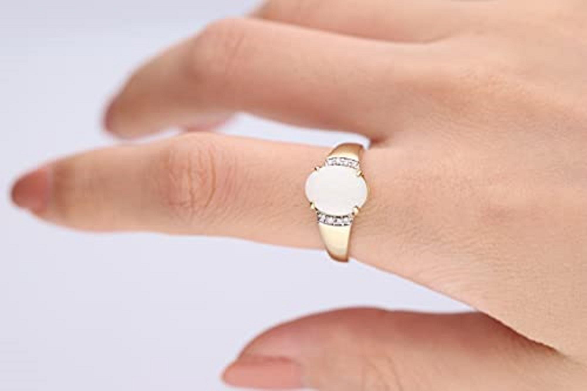 Stunning, timeless and classy eternity Wedding ring. Decorate yourself in luxury with this. The 10K Yellow Gold jewelry boasts 9X11 Oval-Cut Prong Setting Australian Opal (1pcs)1.52 Carat, and Round-Cut Prong Setting (8pcs) 0.04 Carat white diamond