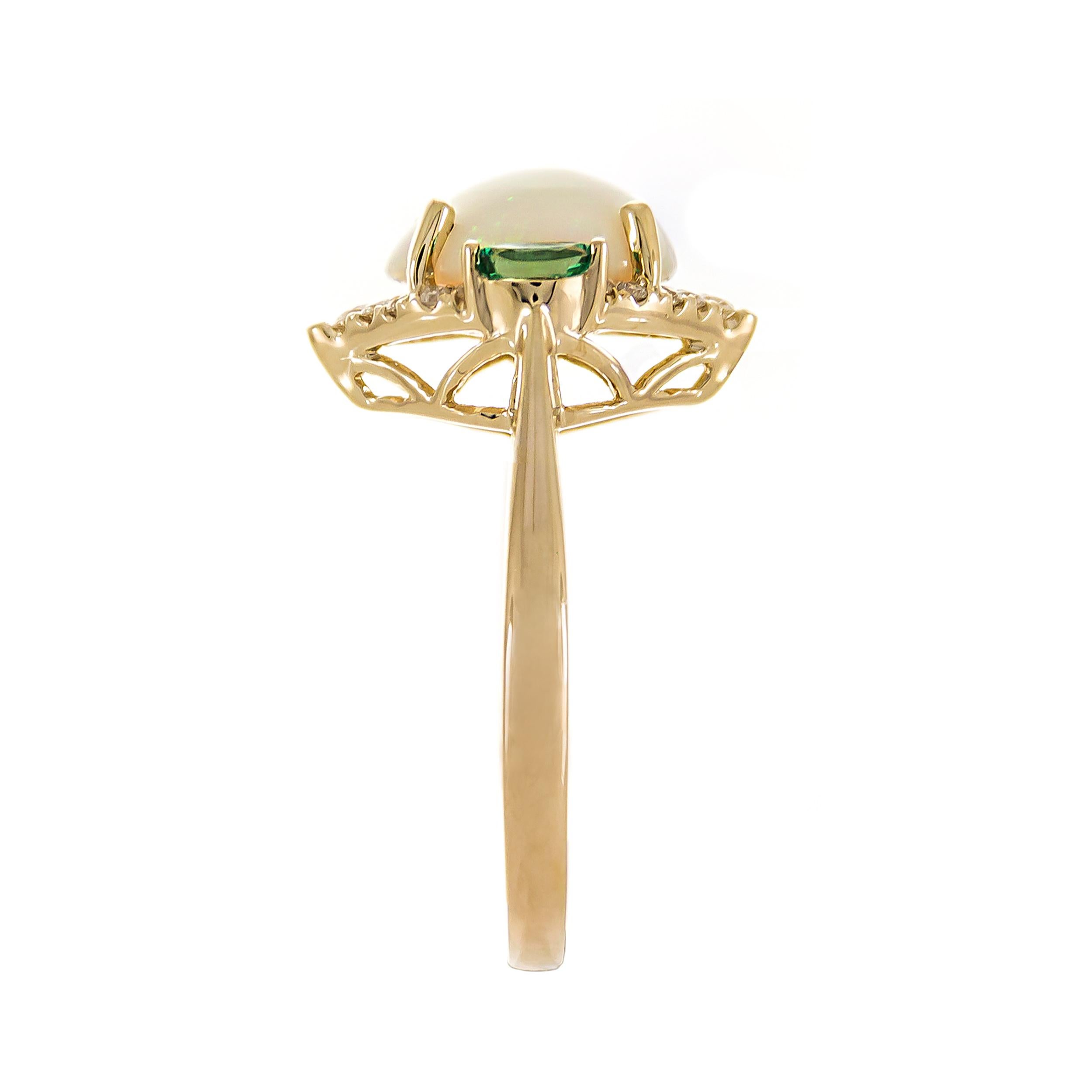 This exquisite ring features a captivating 8x10mm oval-cut Ethiopian opal weighing 1.71 carats, radiating with a mesmerizing play of color. Flanking the center stone are two 2x4mm oval-cut emeralds totaling 0.13 carat, adding a rich green contrast