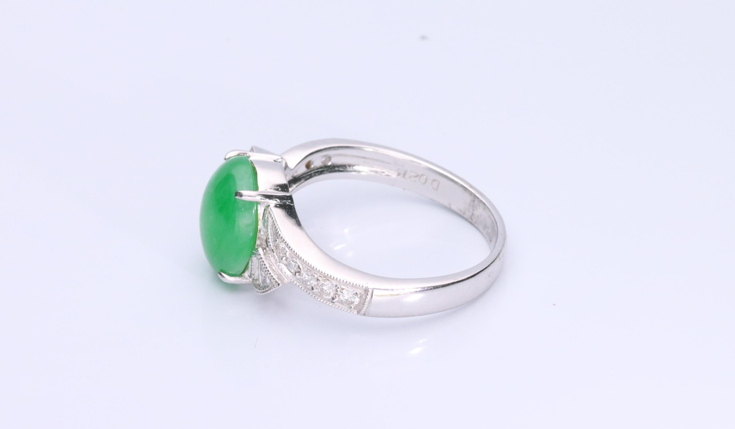 Decorate yourself in elegance with this Ring is crafted from 18-karat White Gold by Gin & Grace. This Ring is made up of Oval-Cab (1 pcs) 2.90 carat Jade and Round-cut White Diamond (10 Pcs) 0.12 carat, Baguette-cut (4 pcs) 0.09 carat. This Ring is