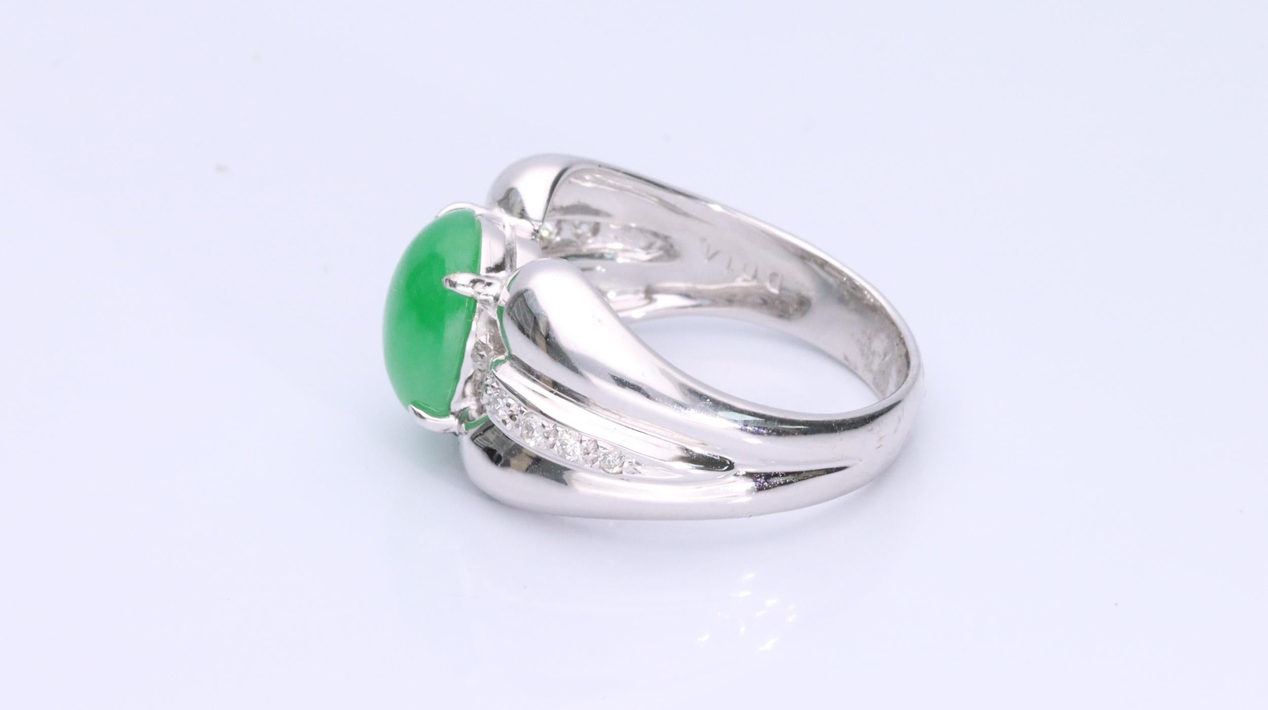 Decorate yourself in elegance with this Ring is crafted from 18-karat White Gold by Gin & Grace. This Ring is made up of Oval-Cab (1 pcs) 3.10 carat Jade and Round-cut White Diamond (10 Pcs) 0.14 carat. This Ring is weight 7.39 grams. This delicate