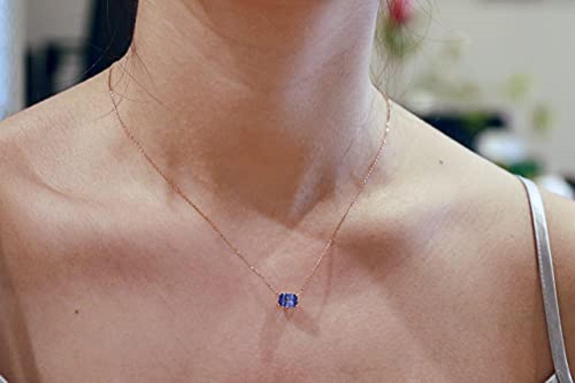 Decorate yourself in elegance with this Necklace is crafted from 10-karat Rose Gold by Gin & Grace Necklace. The jewelry boasts 6X8 Cushion-Cut prong setting Genuine Tanzanite (1pcs) 1.58 Carat. This Necklace is weight 1.84 grams. The gorgeous