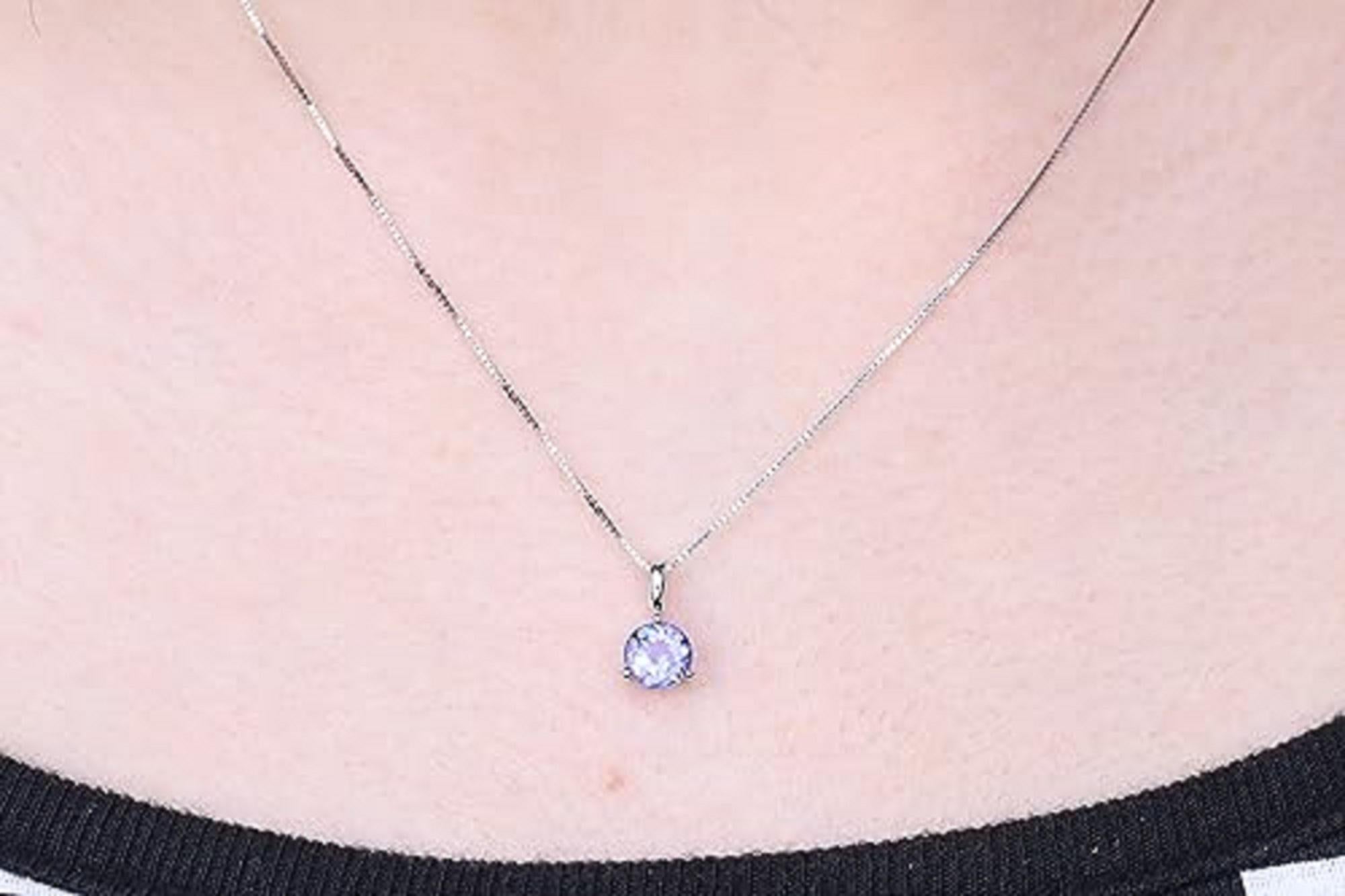 Decorate yourself in elegance with this Pendant is crafted from 10-karat White Gold by Gin & Grace. This Pendant is made up of 6.0 Round-cut Tanzanite (1 Pcs) 0.77 carat . This Pendant is weight 0.340 grams. This delicate Pendant is polished to a