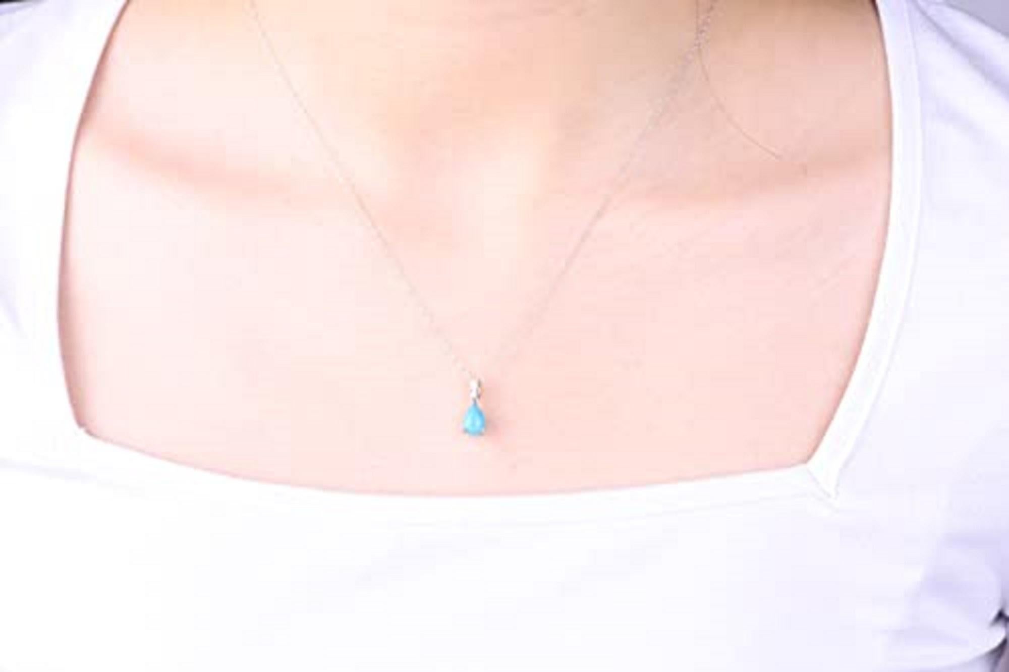 Decorate yourself in elegance with this Pendant is crafted from 10-karat White Gold by Gin & Grace Pendant. This Pendant is made up of 8x6 Pear-cabochon Prong setting Turquoise (1 Pcs) 1.02 Carat and Baguette-Cut Prong setting White Diamond (1 Pcs)