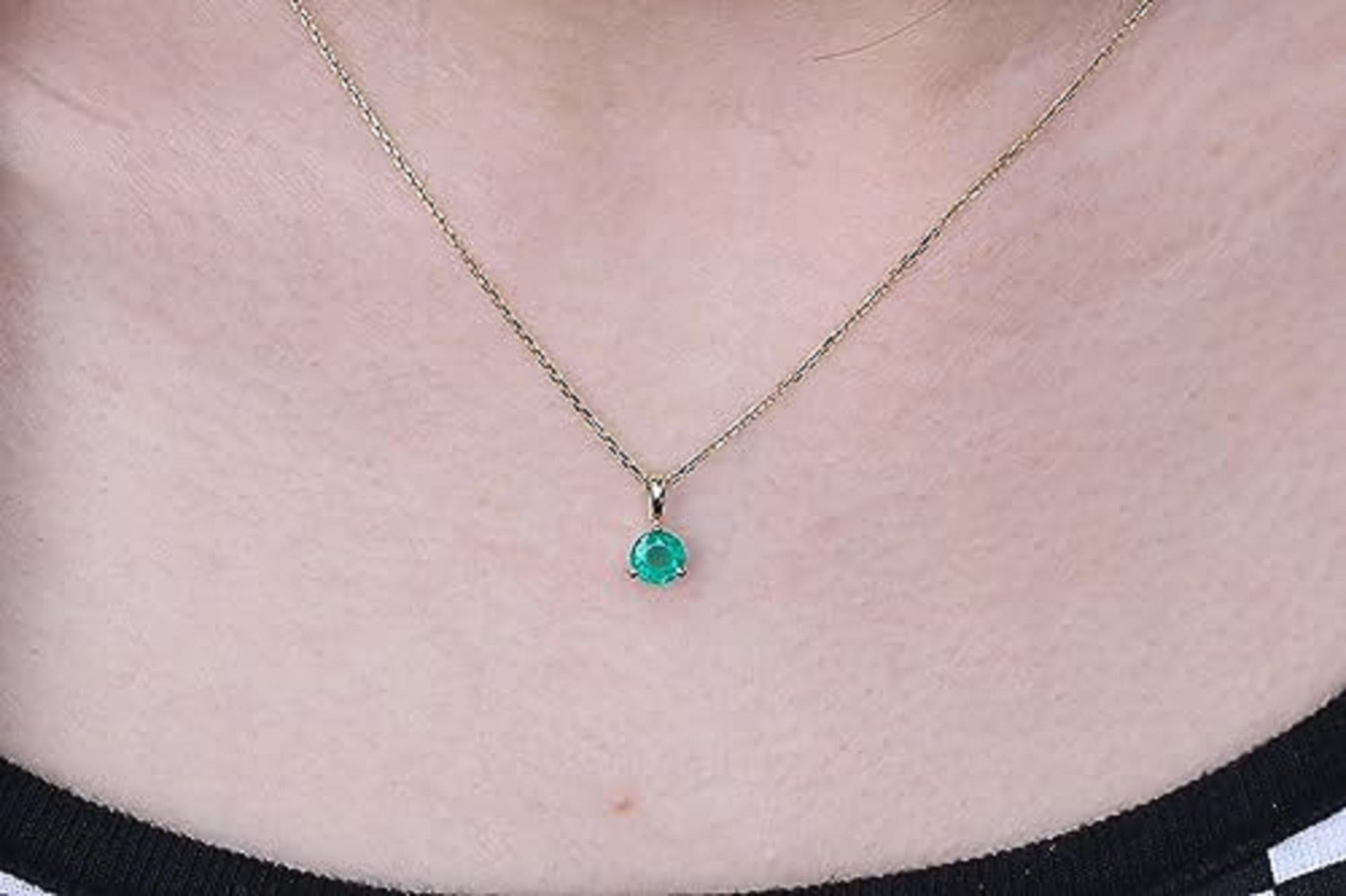 Decorate yourself in elegance with this Pendant is crafted from 10-karat Yellow Gold by Gin & Grace. This Pendant is made up of 5.0 Round-cut Emerald (1 Pcs) 0.470 carat. This Pendant is weight 0.280 grams. This delicate Pendant is polished to a