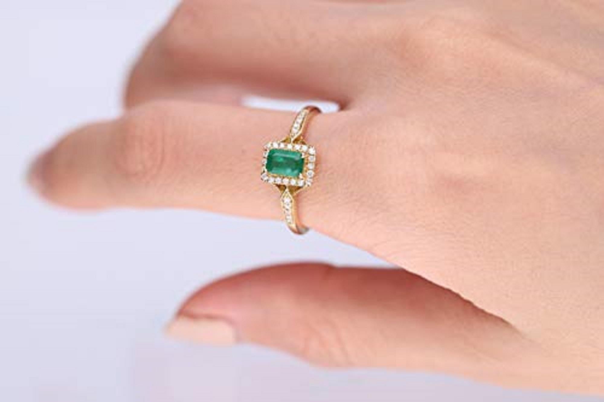 Stunning, timeless and classy eternity Unique Ring. Decorate yourself in luxury with this Gin & Grace Ring. The 10K Yellow Gold jewelry boasts Emerald-Cut Prong Setting Natural Emerald (1 pc) 0.53 Carat, along with Natural Round cut white Diamond