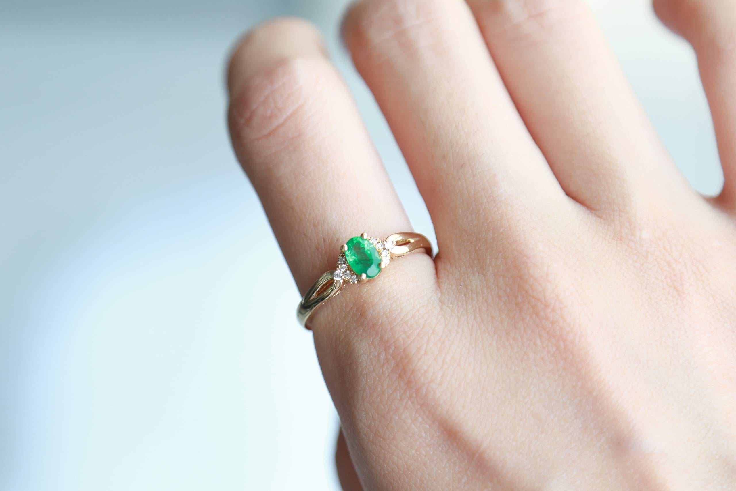 Stunning, timeless and classy eternity Unique ring. Decorate yourself in luxury with this Gin & Grace ring. The 10k Yellow Gold jewelry boasts 4X6 Oval-Cut Prong Setting Natural Emerald (1pcs) 0.45 Carat and Round-Cut Prong Setting Natural Diamond