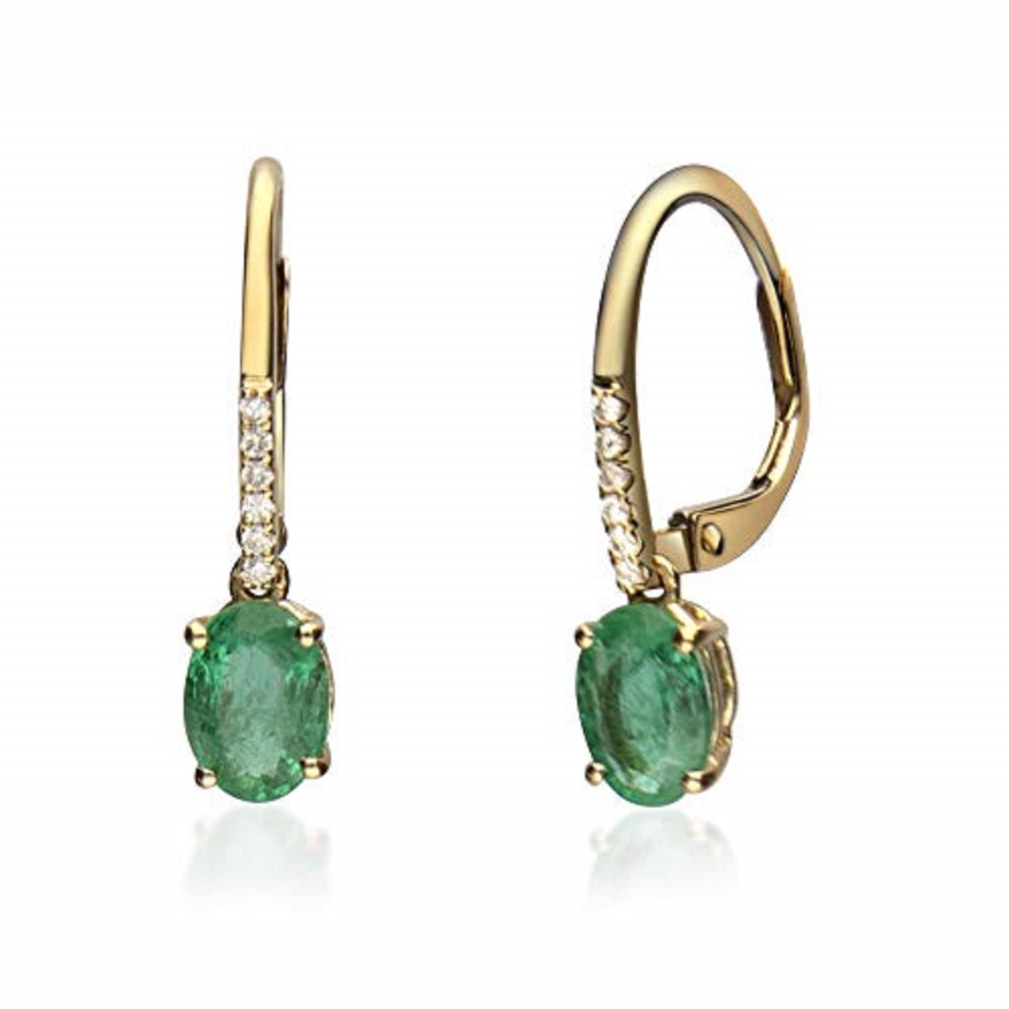 Decorate yourself in elegance with this Earring is crafted from 10K Yellow Gold by Gin & Grace Earring. This Earring is made up of 5X7 Oval-Cut prong setting Natural Emerald (2 pcs) 1.50 Carat and Round-Cut prong setting Diamond (12 pcs) 0.06 Carat.