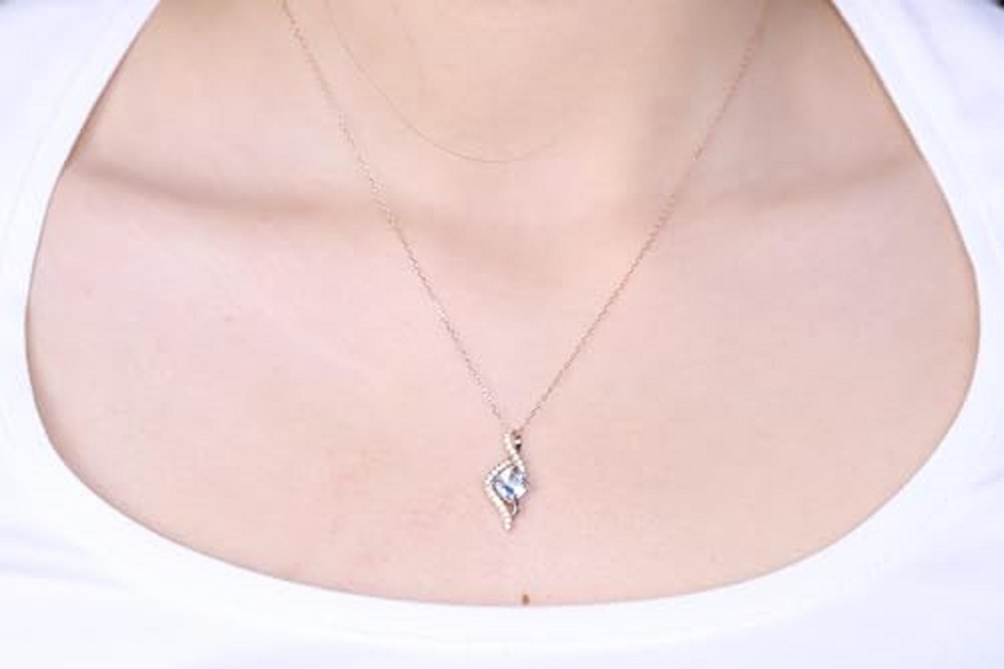 Decorate yourself in elegance with this Pendant is crafted from 14-karat Rose Gold by Gin & Grace Pendant. This Pendant is made up of 6.0mm Cushion-cut Prong setting Aquamarine (1 Pcs) 0.86 Carat and Round-Cut Prong setting White Diamond (25 Pcs)