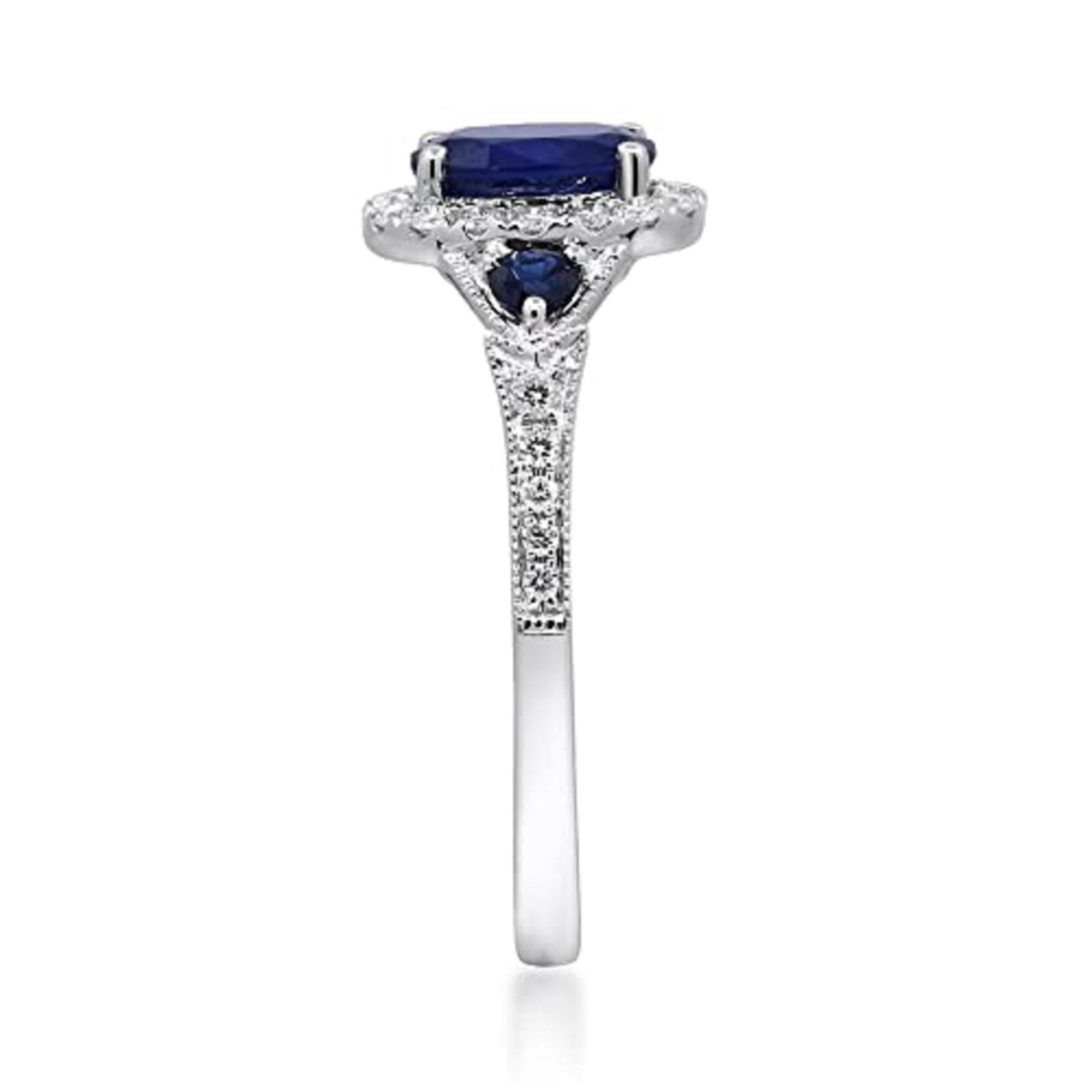 Decorate yourself in elegance with this Ring is crafted from 14-karat White Gold by Gin & Grace. This Ring is made up of 7x5 mm Oval-Cut Blue Sapphire (1 pcs) 0.94 carat, Round-cut Blue Sapphire (2 pcs) 0.17 carat and Round-cut White Diamond (26
