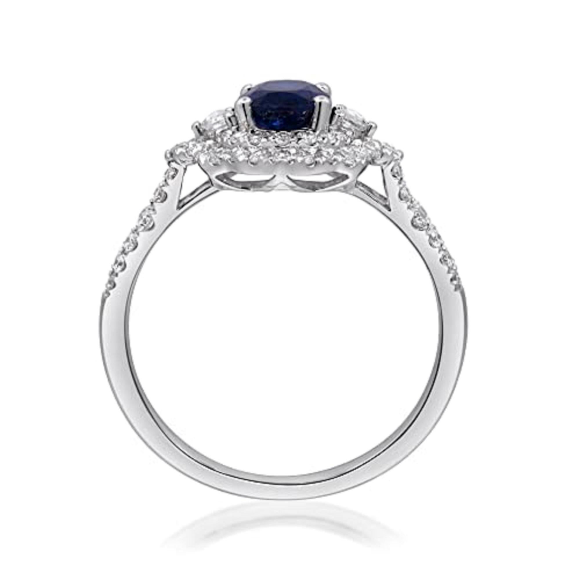 Decorate yourself in elegance with this Ring is crafted from 14-karat White Gold by Gin & Grace. This Ring is made up of 7x5 Oval-Cut (1 pcs) 0.80 carat Blue Sapphire and Round-cut White Diamond (64 Pcs) 0.56 Carat. This Ring is weight 2.56 grams.