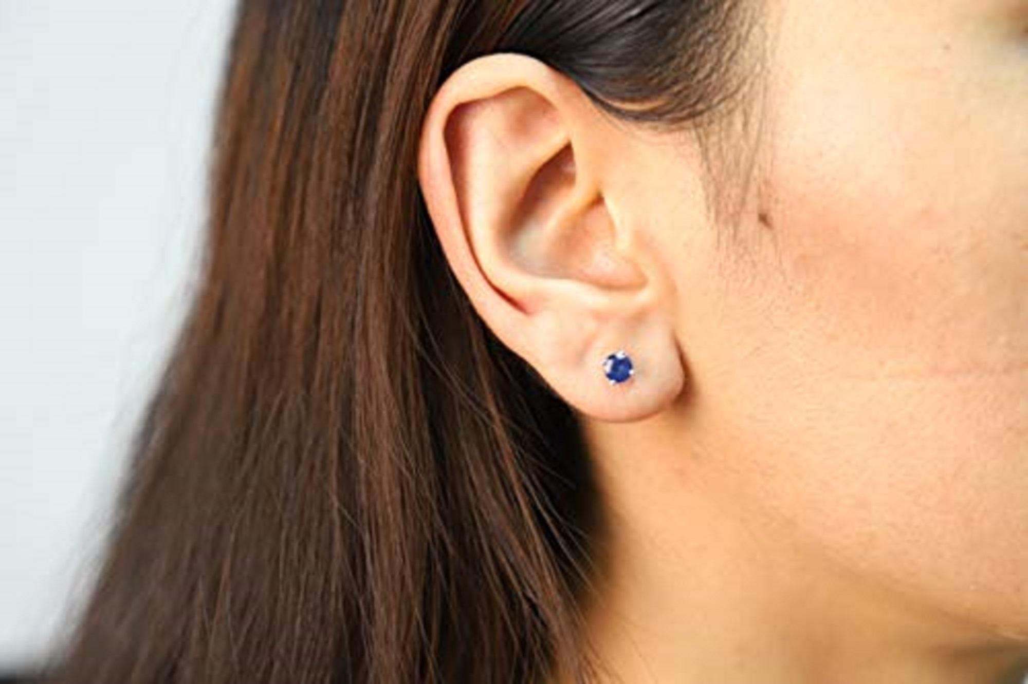 Decorate yourself in elegance with this Earring is crafted from 14K White Gold by Gin & Grace Earring. The jewelry boasts 5MM Round-Cut prong setting Blue color Blue Sapphire (2 pcs) 1.24 Carat. This Earring is weight 0.82 grams. This delicate