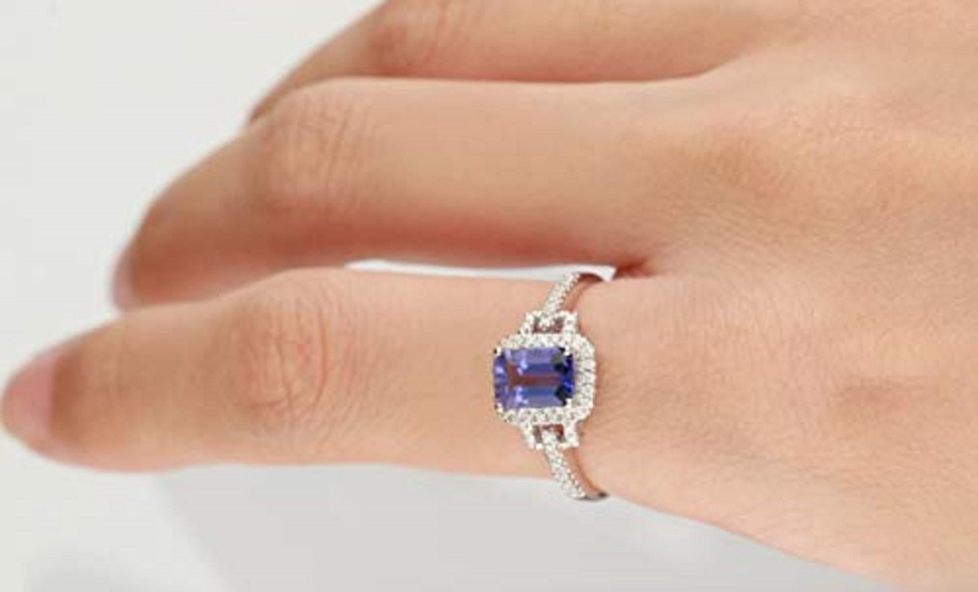 Stunning, timeless and classy eternity Unique Ring. Decorate yourself in luxury with this Gin & Grace Ring. The 14k White Gold jewelry boasts Emerald-Cut Prong Setting Genuine Tanzanite (1 pcs) 1.13 Carat, along with Natural Round cut white Diamond