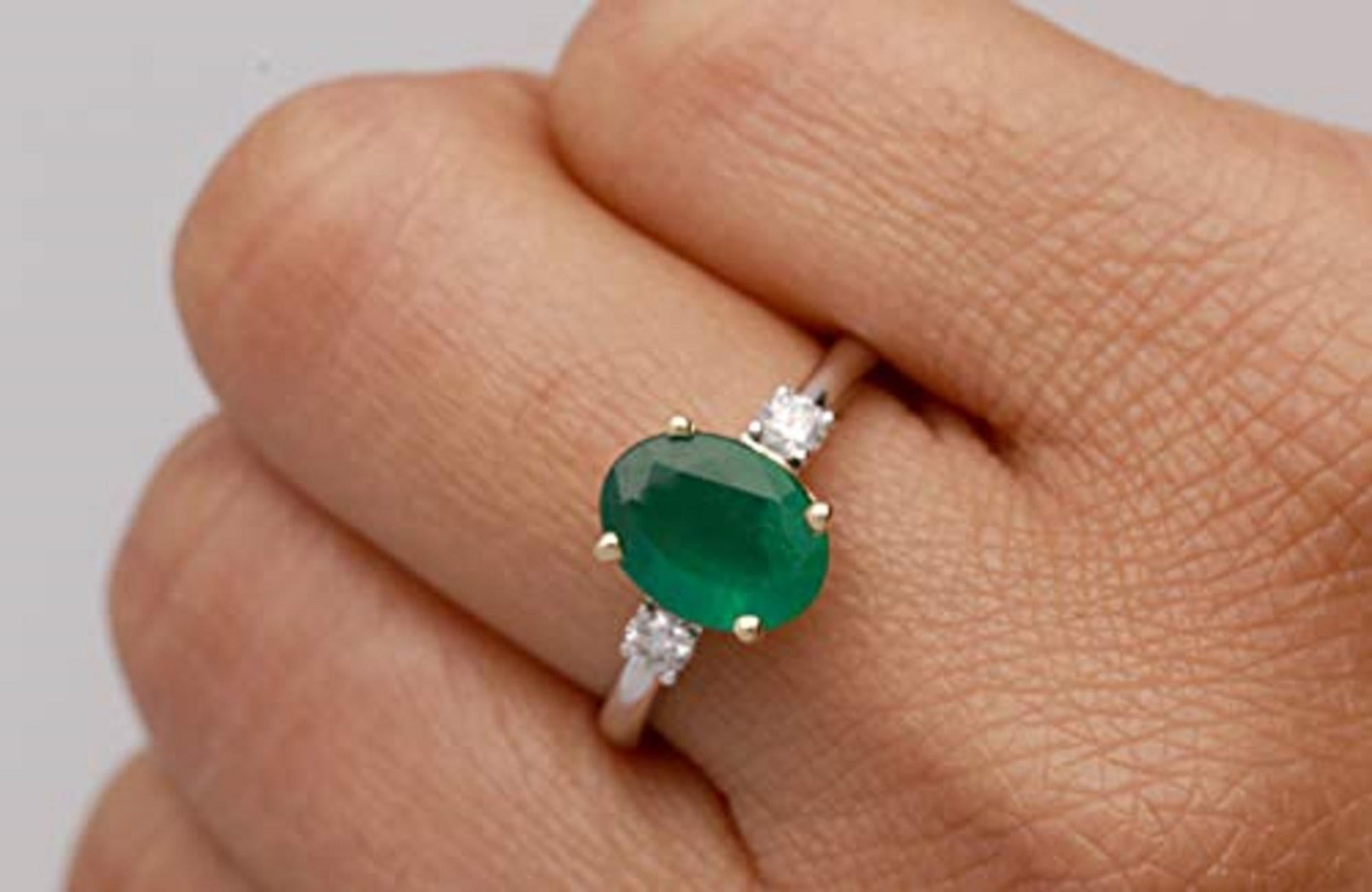 Exquisitely rendered in 14-karat white gold, this ring holds a prong-set oval-cut Gin & Grace Natural emerald accented with 0.20 carat of dazzling, genuine diamonds. A high polish finish enhances the ring, giving it a radiant shine. Jewelry type: