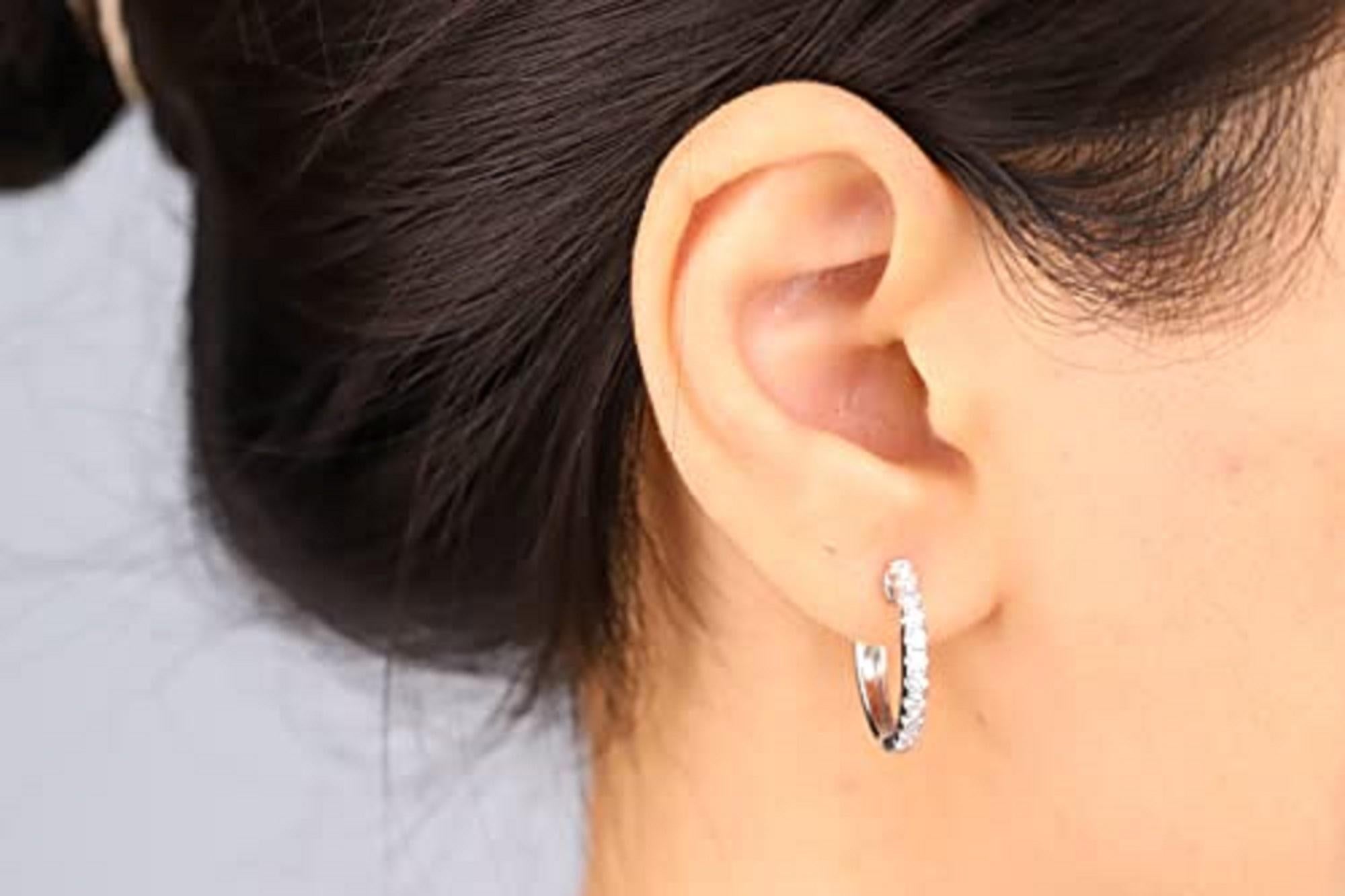Decorate yourself in elegance with this Earring is crafted from 14-karat white Gold by Gin & Grace. This Earring is made up of Round-cut White Diamond (24 Pcs) 0.52 Carat. This Earring is weight 4.23 grams. This delicate Earring is polished to a