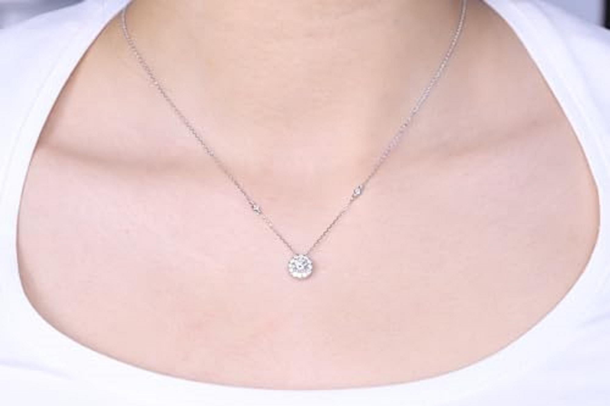 Decorate yourself in elegance with this Pendant is crafted from 14-karat White Gold by Gin & Grace. This Pendant is Round-cut White Diamond (13 Pcs) 0.79 Carat. This Pendant is weight 2.33 grams. This delicate Pendant is polished to a high finish